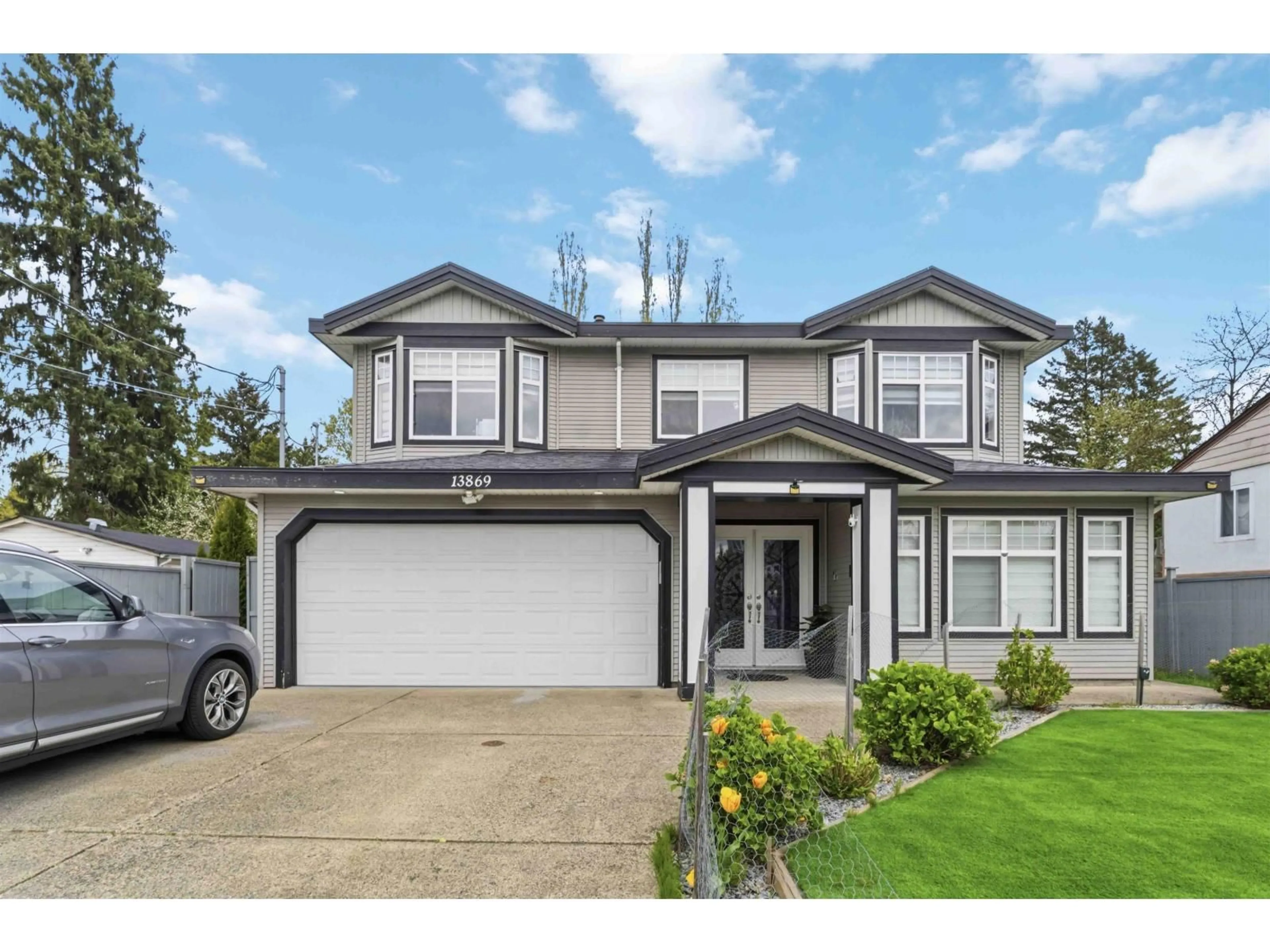 Home with vinyl exterior material, street for 13869 BRENTWOOD CRESCENT, Surrey British Columbia V3R5M1