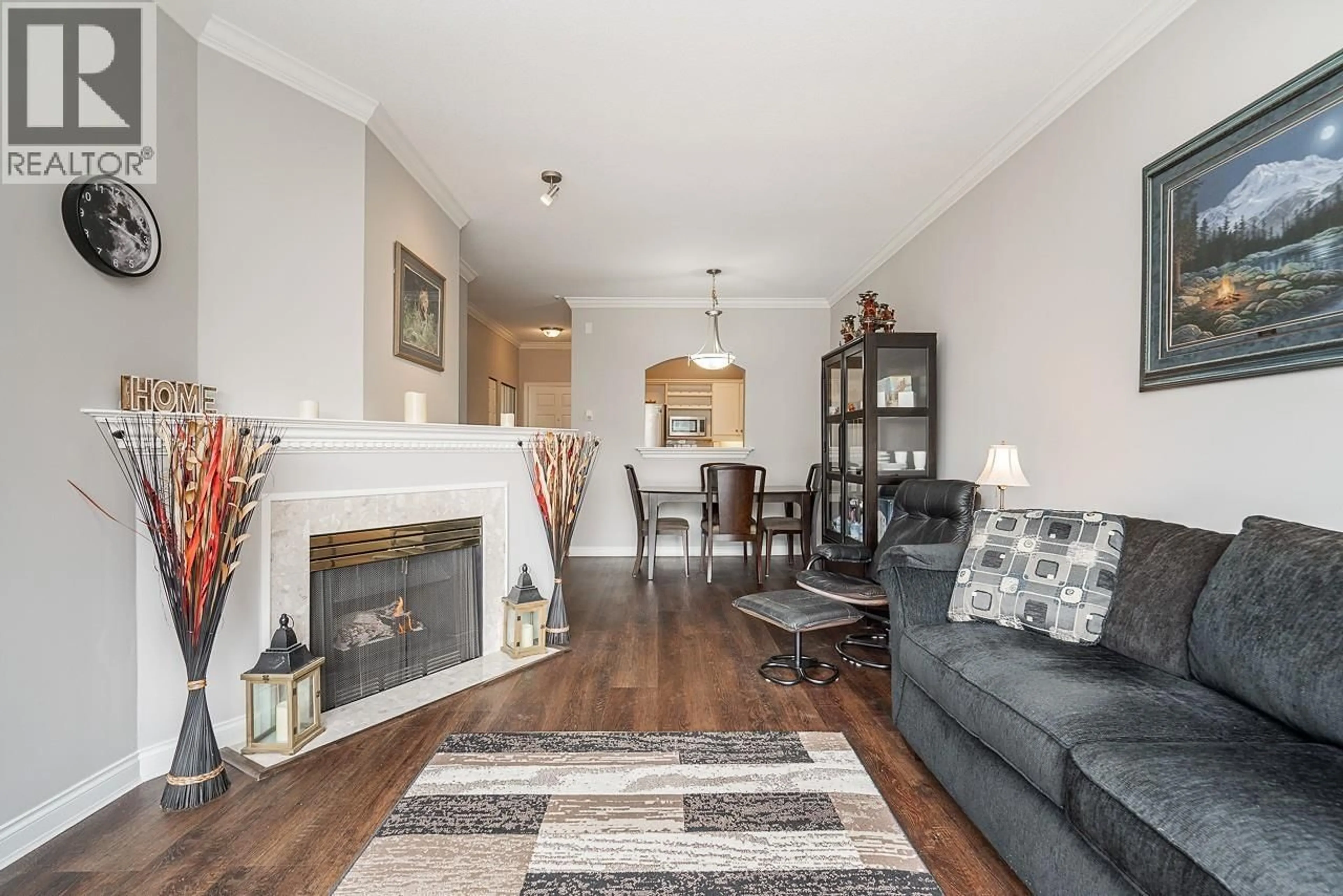 Living room with furniture, wood/laminate floor for 316 - 2985 PRINCESS CRESCENT, Coquitlam British Columbia V3B7P3