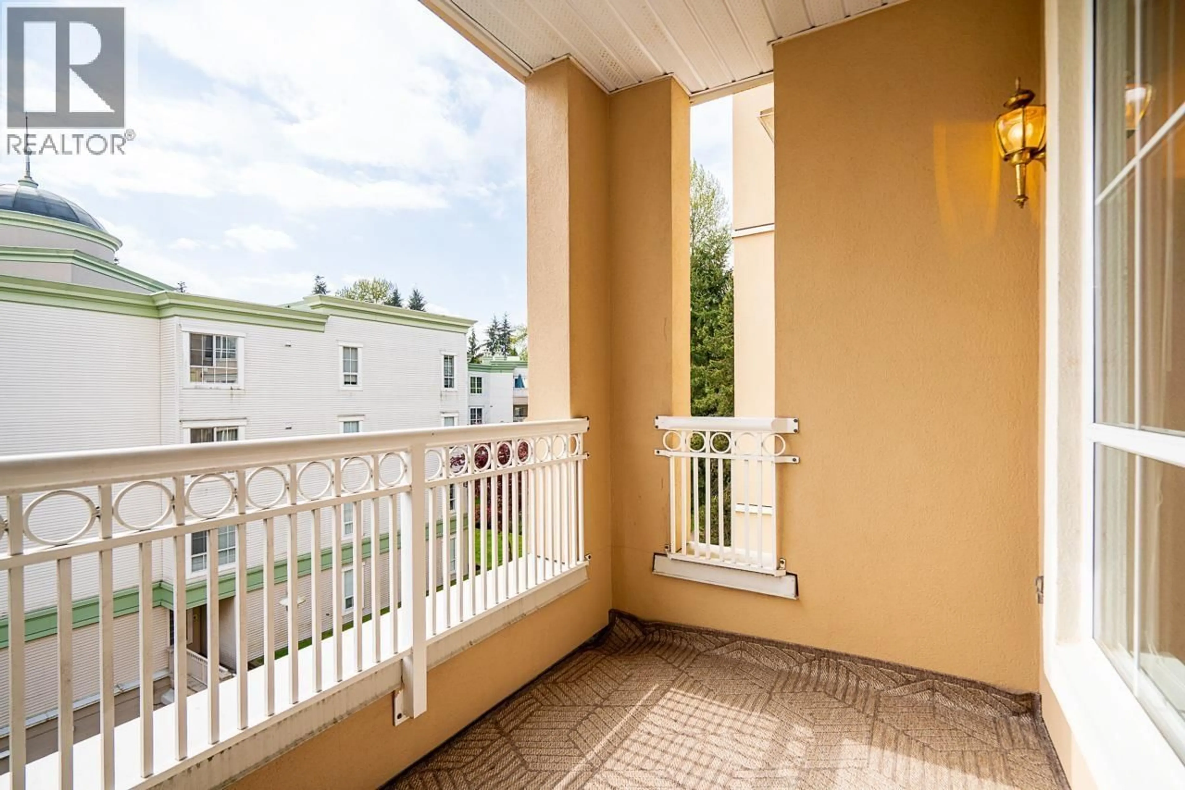 Balcony in the apartment, city buildings view from balcony for 316 - 2985 PRINCESS CRESCENT, Coquitlam British Columbia V3B7P3