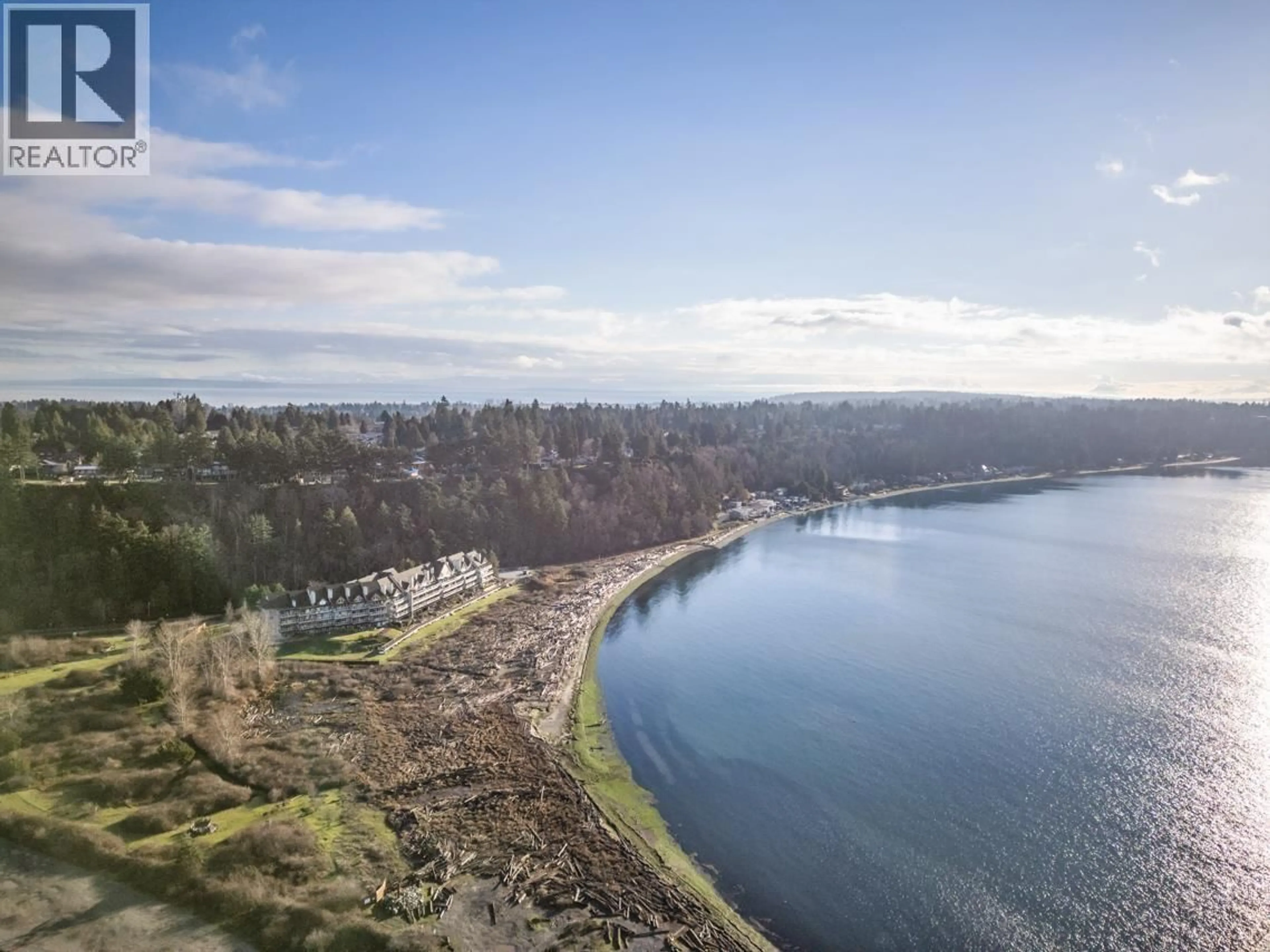 A pic from outside/outdoor area/front of a property/back of a property/a pic from drone, water/lake/river/ocean view for 319 - 1120 TSATSU SHORES DRIVE, Delta British Columbia V4M4G3