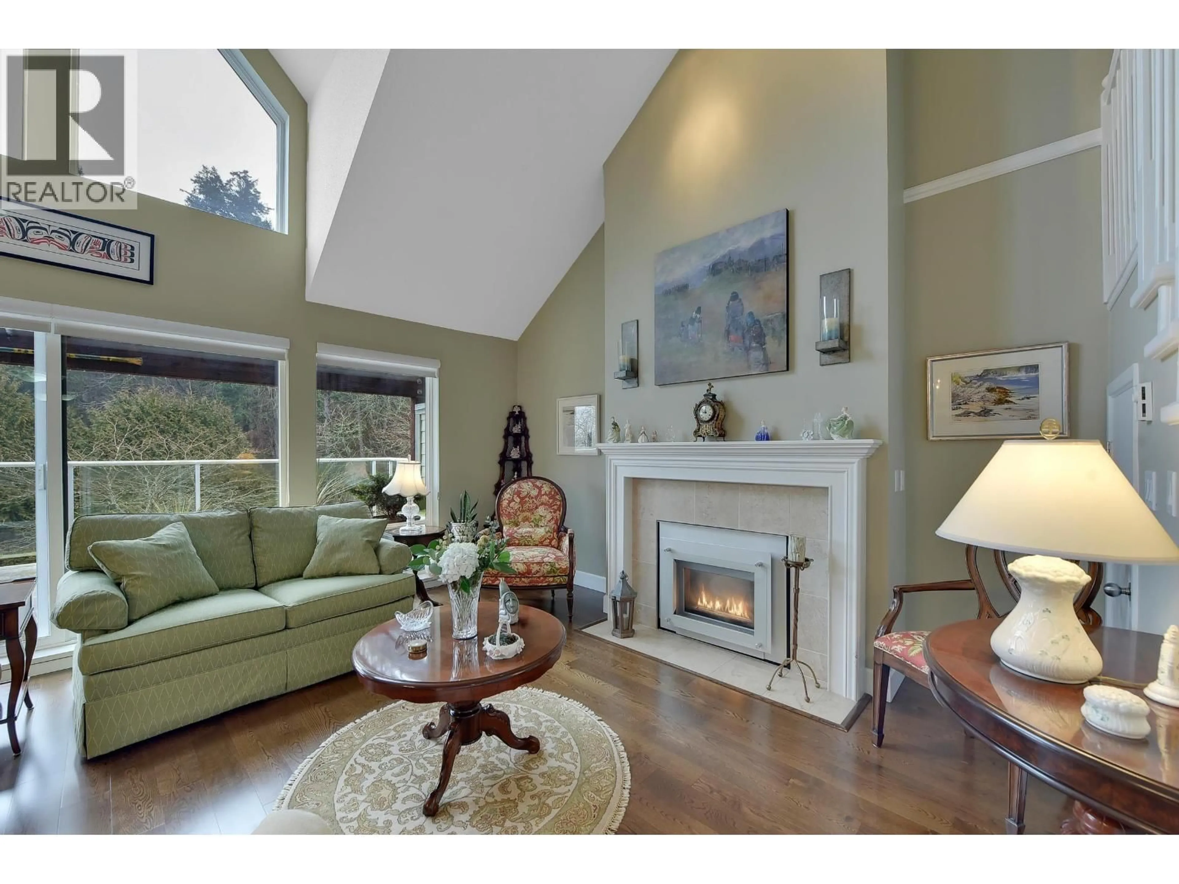 Living room with furniture, wood/laminate floor for 319 - 1120 TSATSU SHORES DRIVE, Delta British Columbia V4M4G3