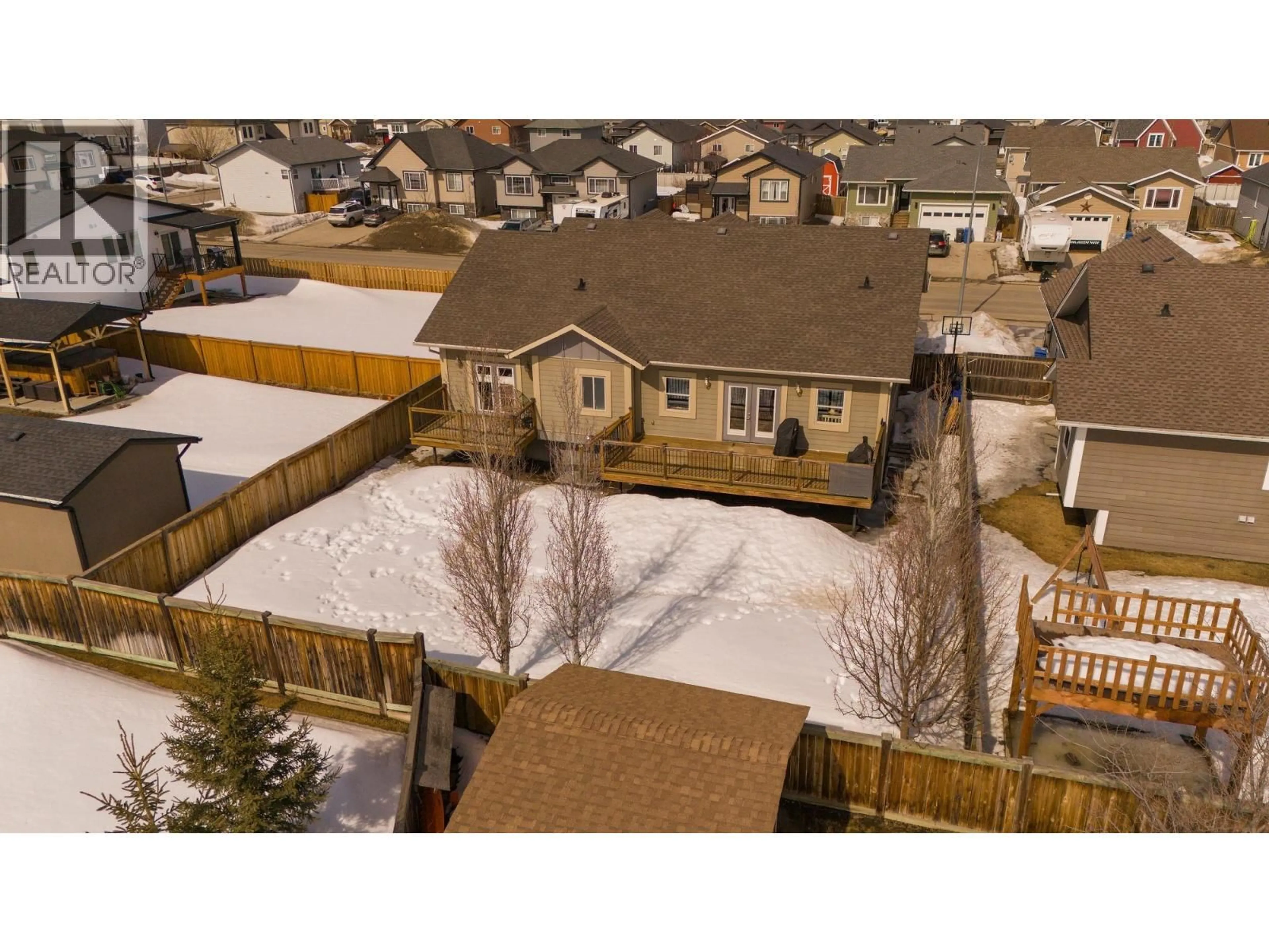 A pic from outside/outdoor area/front of a property/back of a property/a pic from drone, street for 8711 112 AVENUE, Fort St. John British Columbia V1J0H9