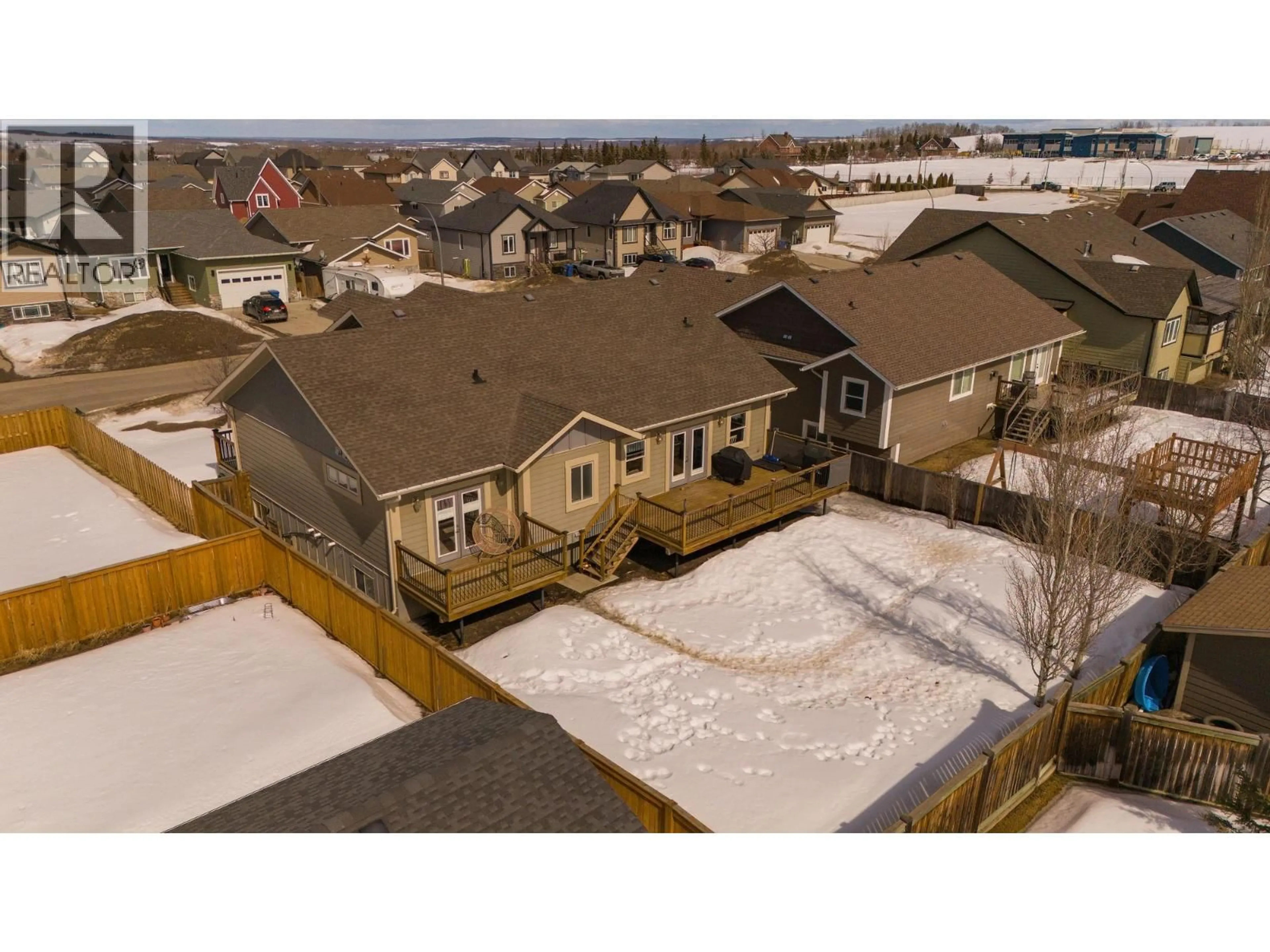 A pic from outside/outdoor area/front of a property/back of a property/a pic from drone, unknown for 8711 112 AVENUE, Fort St. John British Columbia V1J0H9