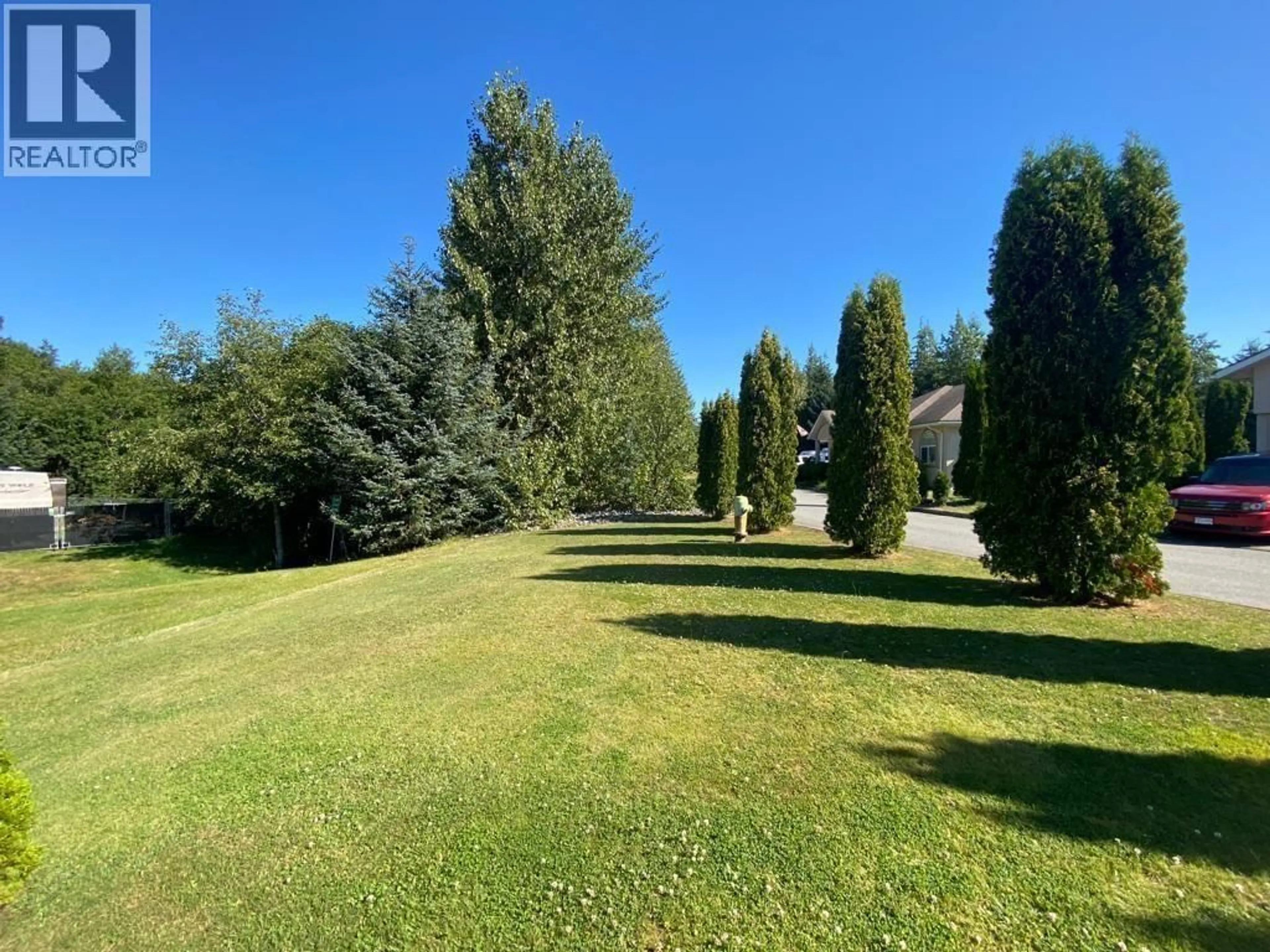 A pic from outside/outdoor area/front of a property/back of a property/a pic from drone, forest/trees view for 1 - 90 SMITH STREET, Kitimat British Columbia V8C2R5