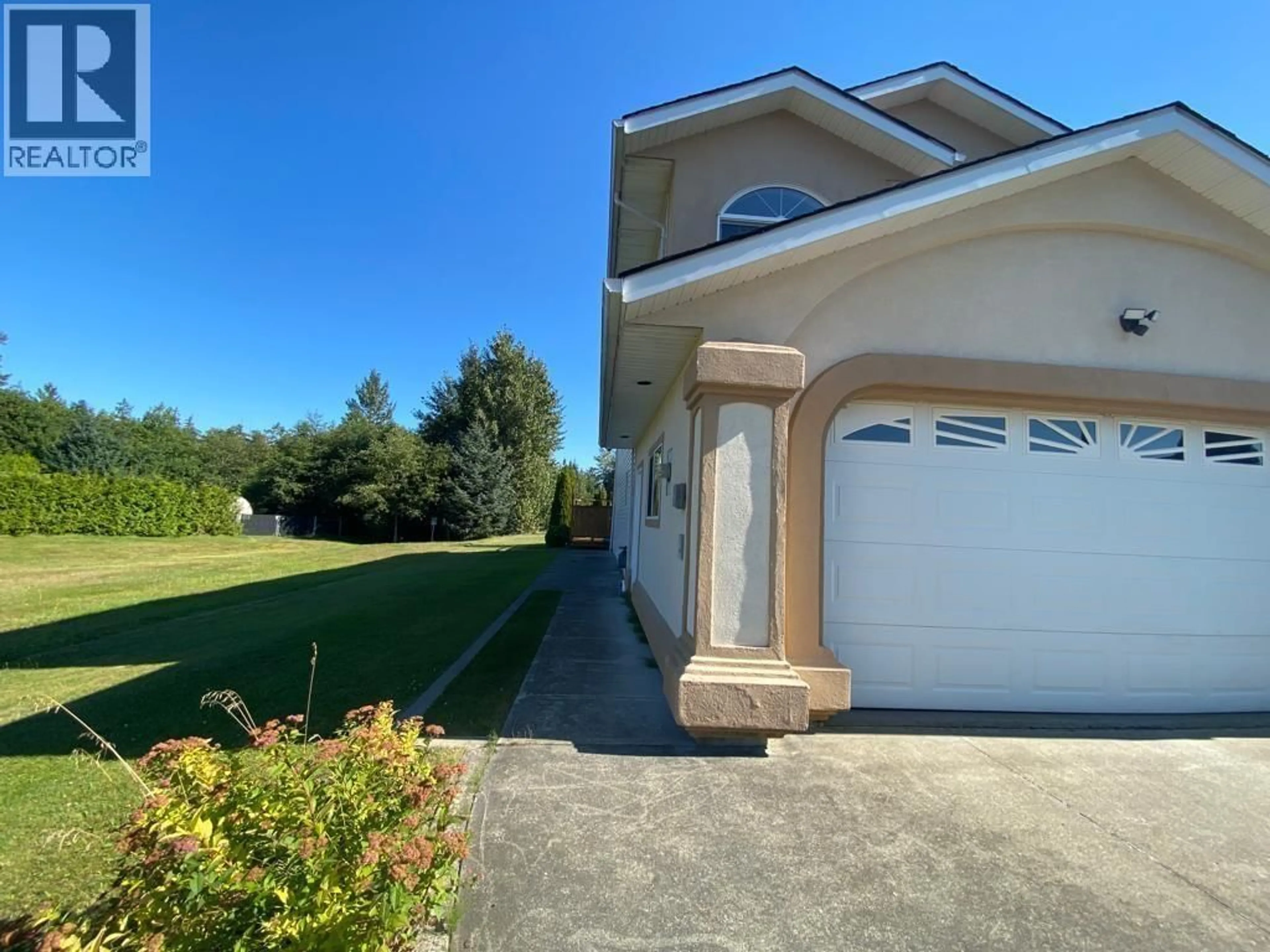 A pic from outside/outdoor area/front of a property/back of a property/a pic from drone, water/lake/river/ocean view for 1 - 90 SMITH STREET, Kitimat British Columbia V8C2R5
