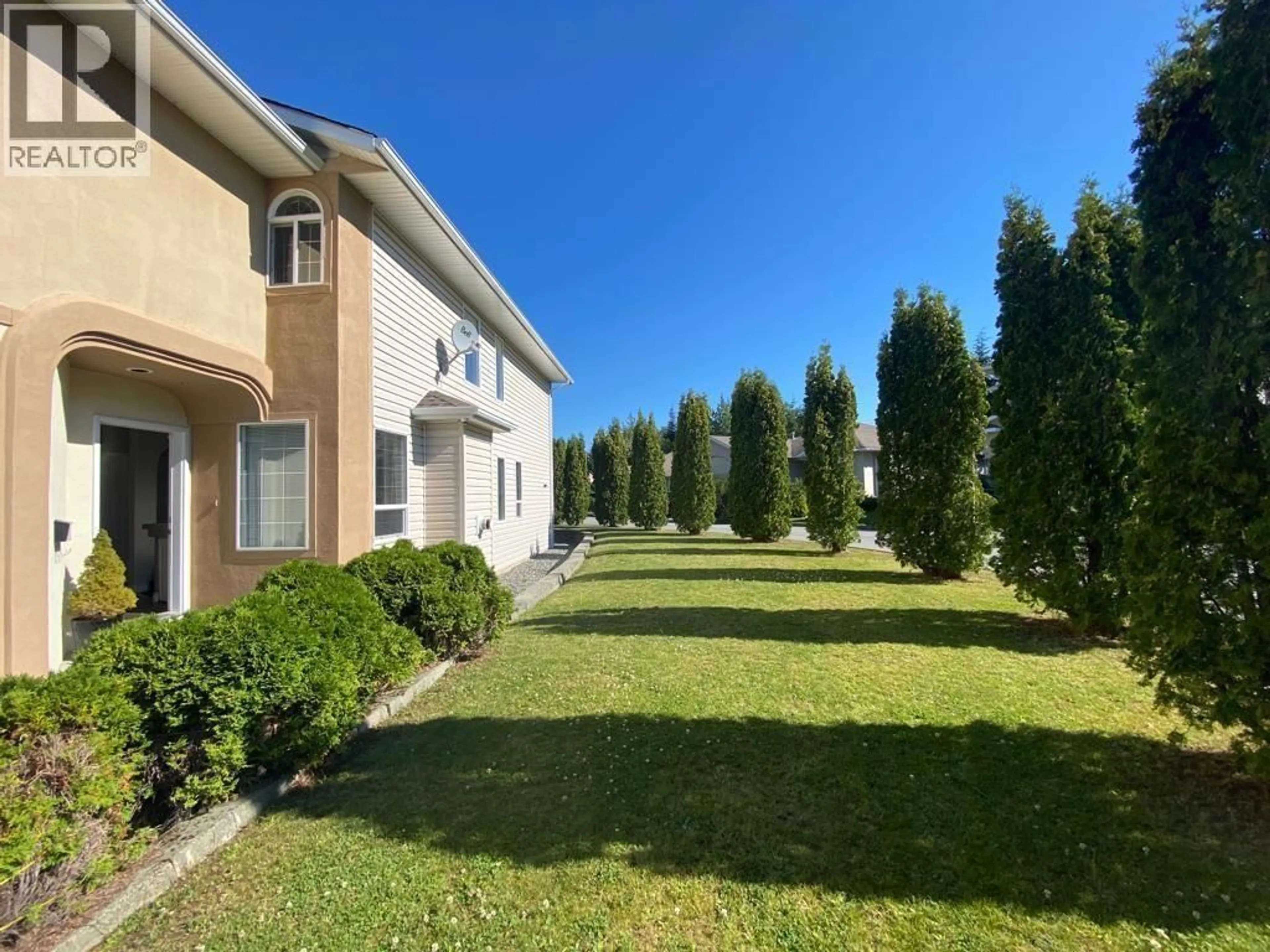 A pic from outside/outdoor area/front of a property/back of a property/a pic from drone, street for 1 - 90 SMITH STREET, Kitimat British Columbia V8C2R5