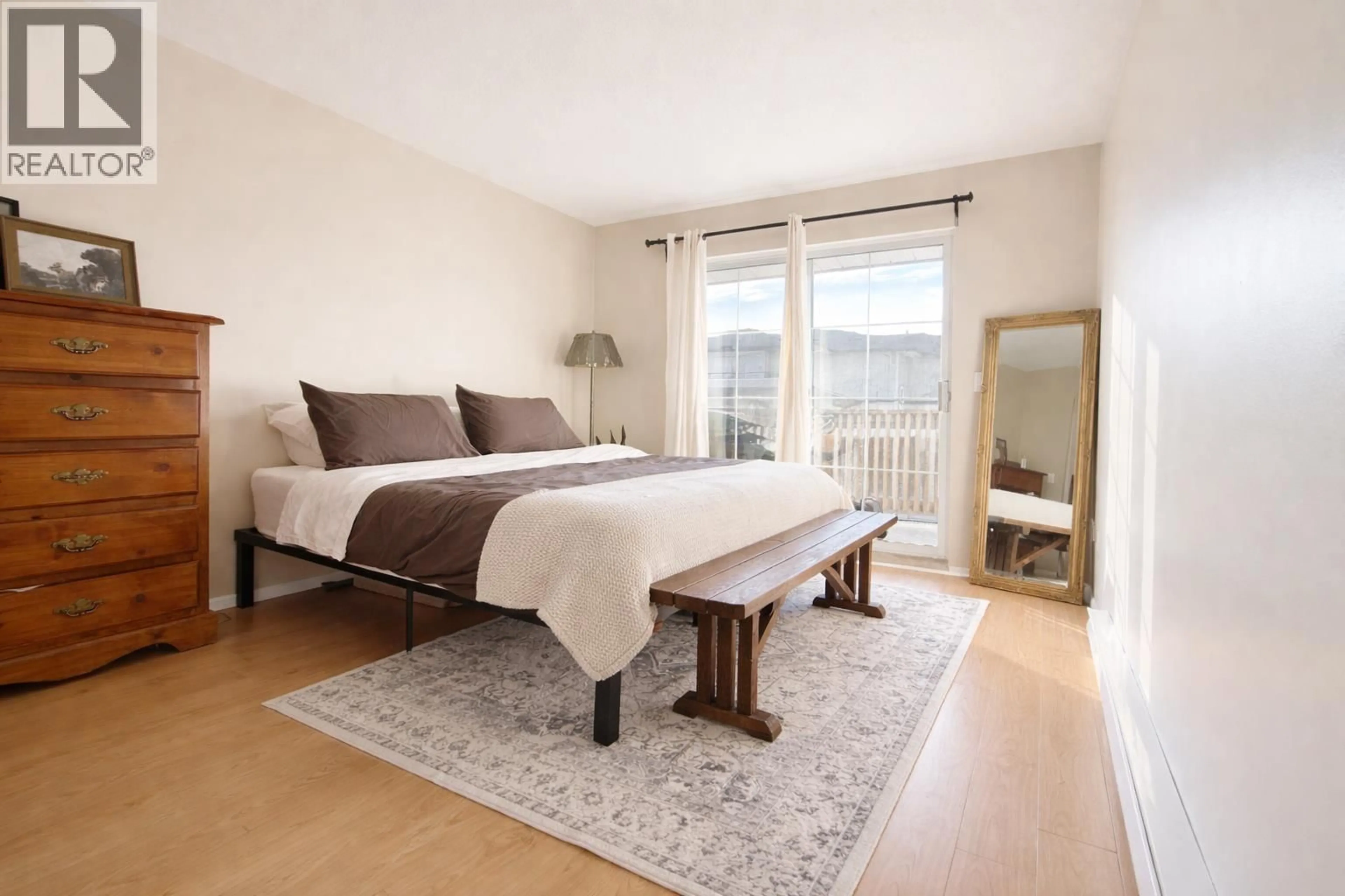 Bedroom with bed, wood/laminate floor for 315 - 888 GAUTHIER AVENUE, Coquitlam British Columbia V3K6Y1