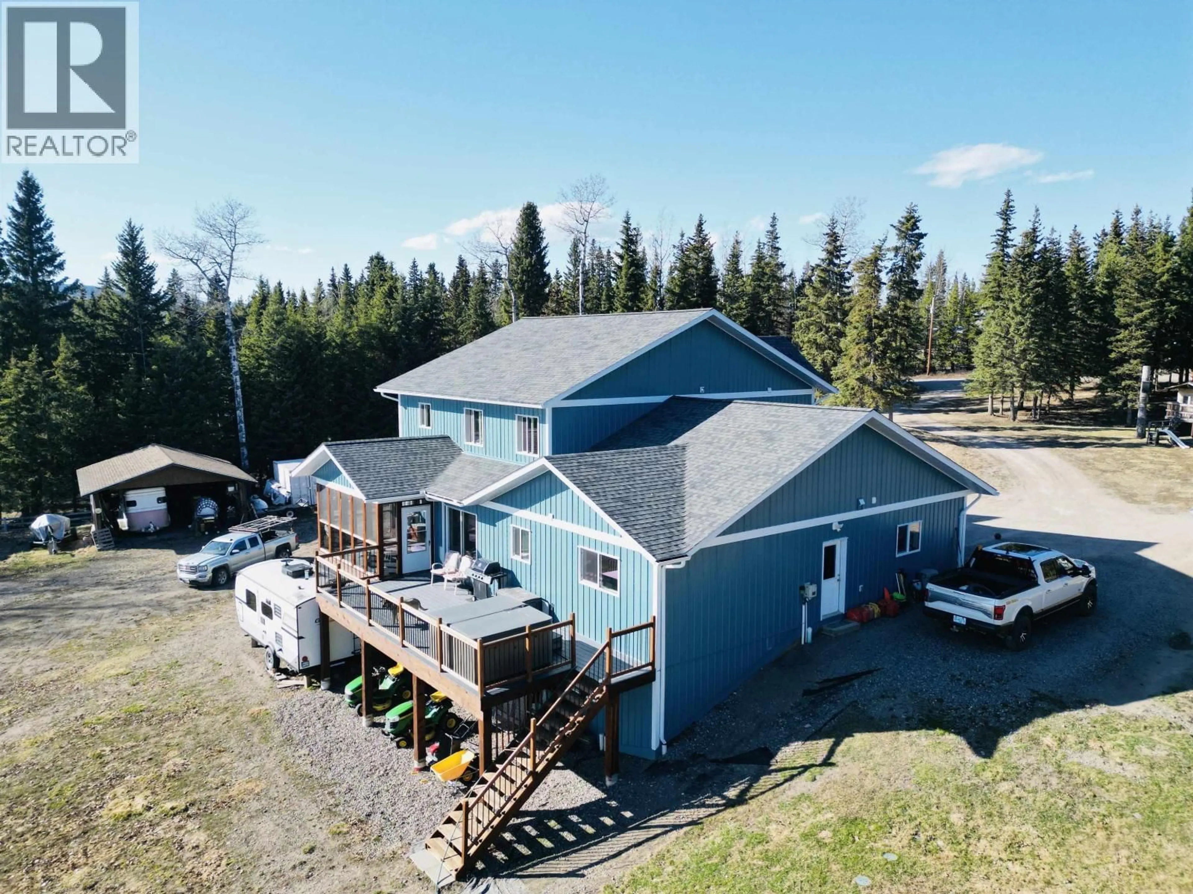 A pic from outside/outdoor area/front of a property/back of a property/a pic from drone, mountain view for 3789 TCHESINKUT ROAD, Burns Lake British Columbia V0J1E2