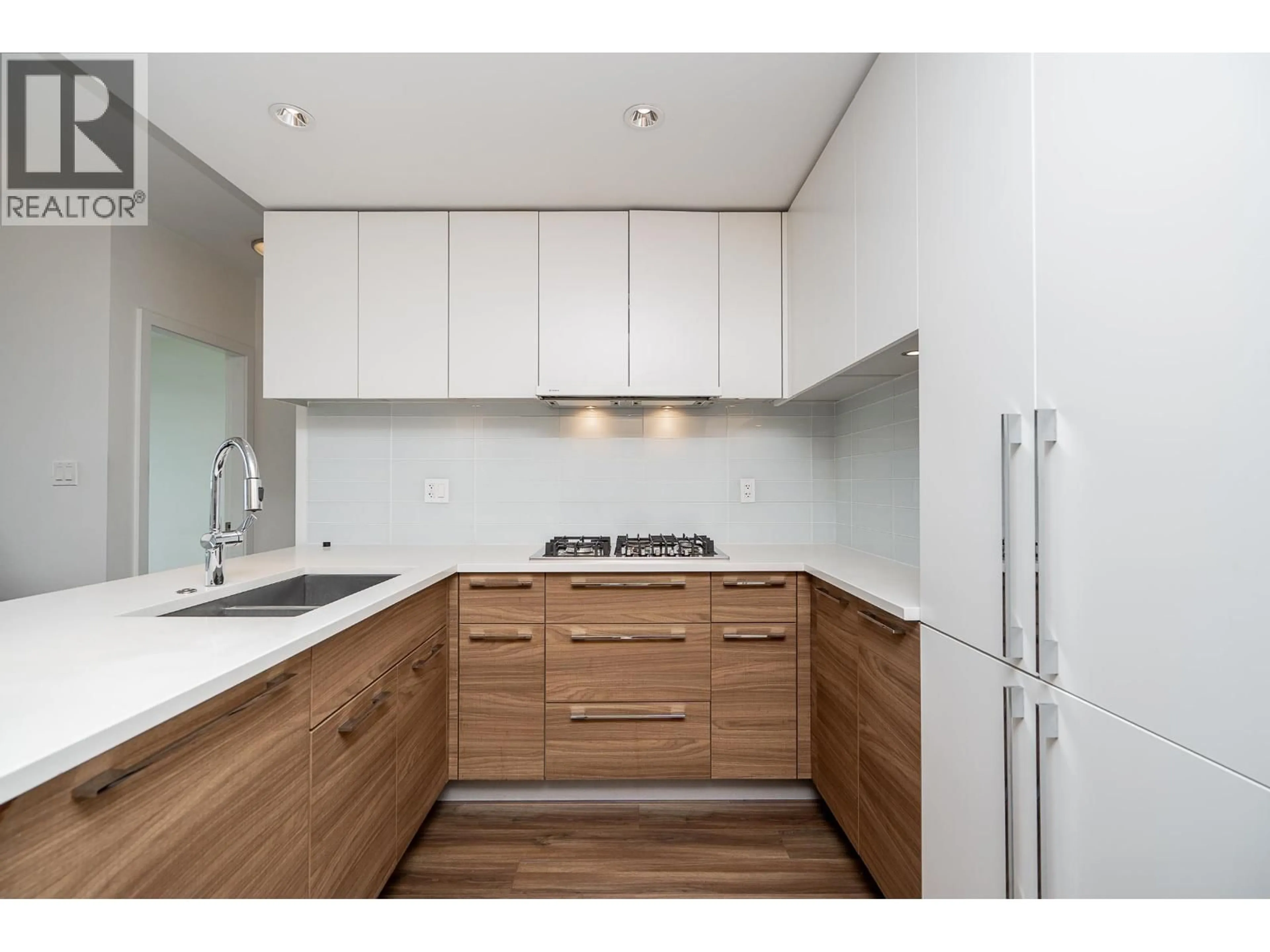 Standard kitchen, wood/laminate floor for 2501 - 1188 PINETREE WAY, Coquitlam British Columbia V3B0K9