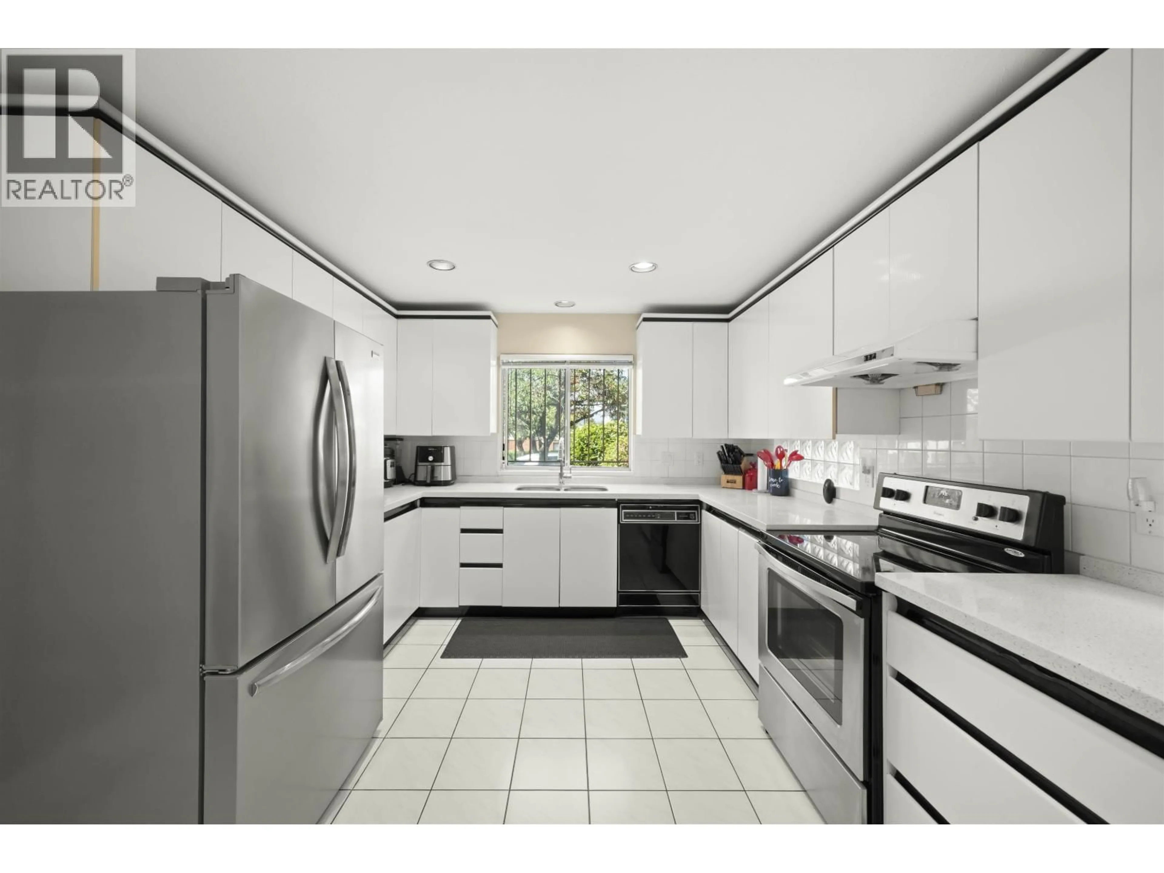 Standard kitchen, ceramic/tile floor for 3838 PENTICTON STREET, Vancouver British Columbia V5R6A1