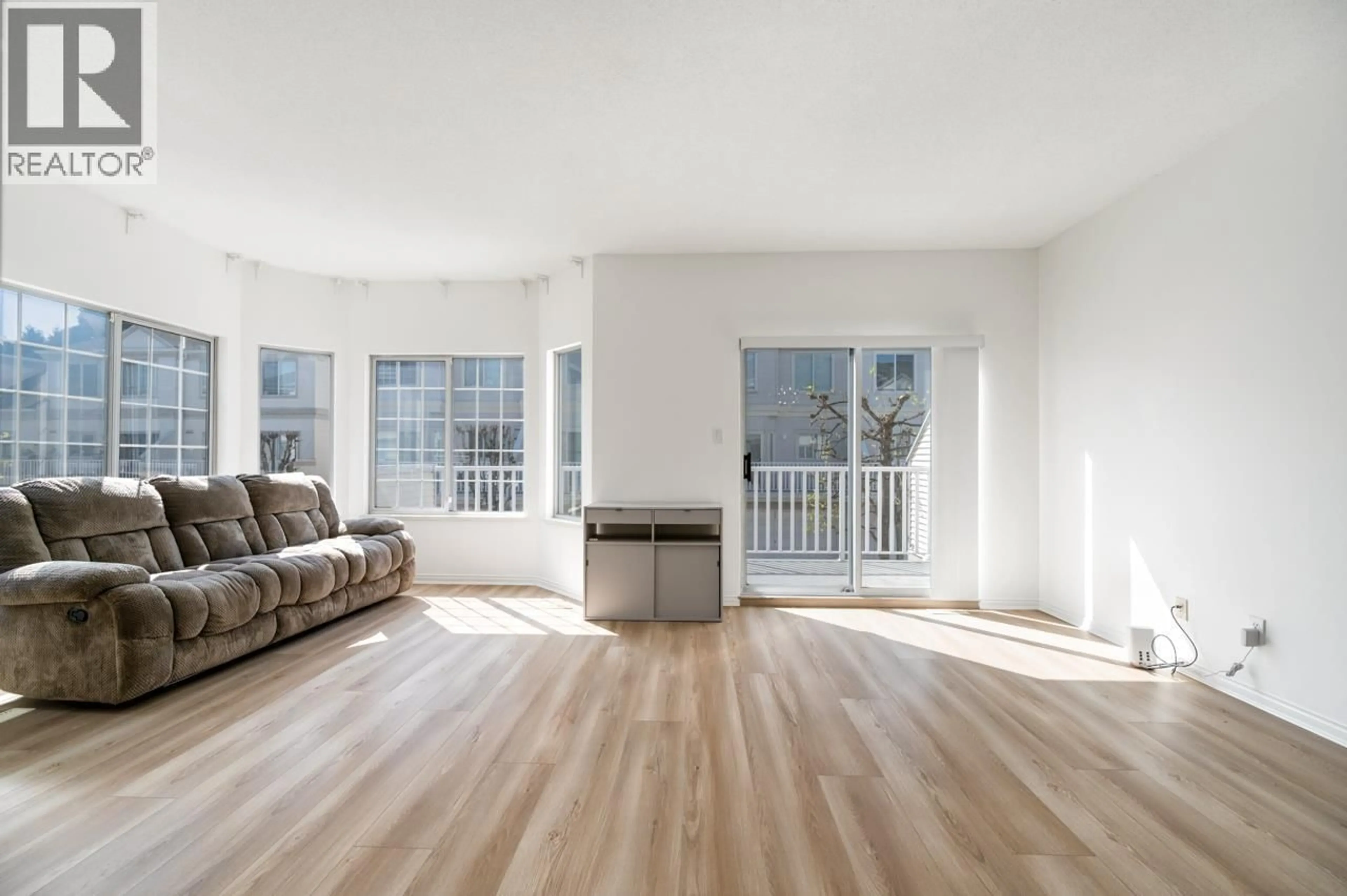 Living room with furniture, wood/laminate floor for 42 - 12871 JACK BELL DRIVE, Richmond British Columbia V6V2T8