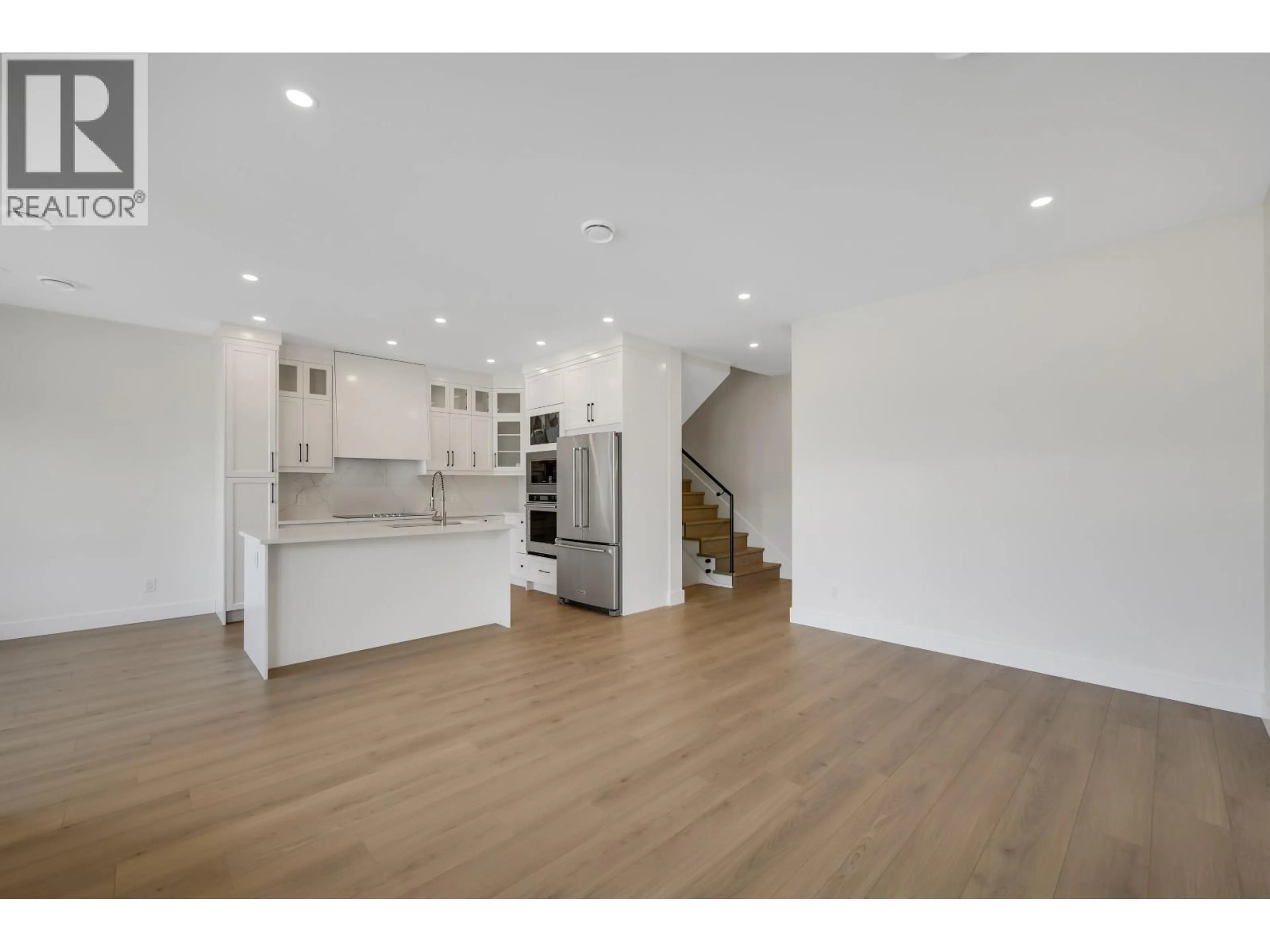 Open concept kitchen, wood/laminate floor for 1005 PHARE CRESCENT, Pemberton British Columbia V0N2L1