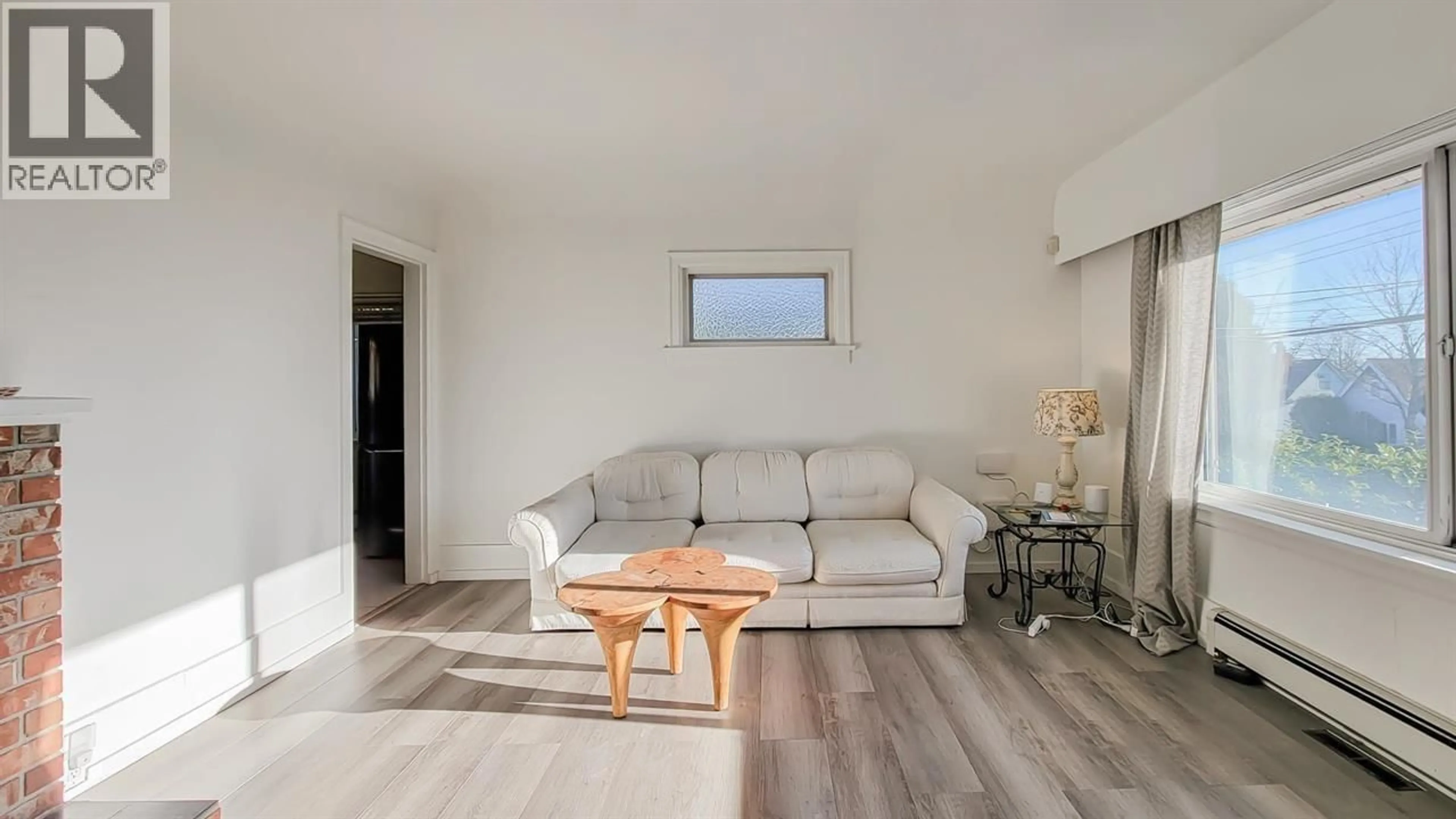 Living room with furniture, wood/laminate floor for 1515 EIGHTH AVENUE, New Westminster British Columbia V3M2S5