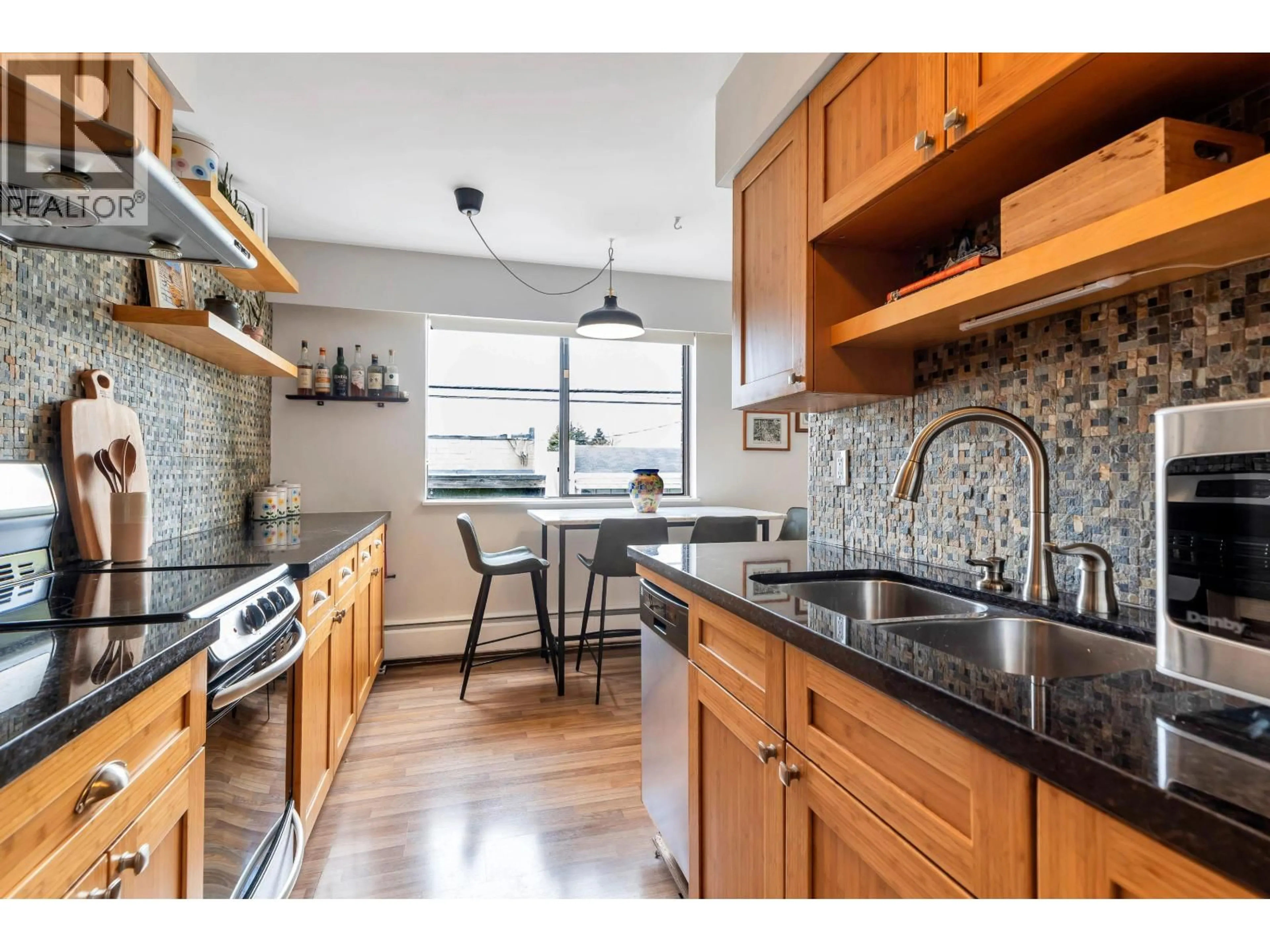 Open concept kitchen, unknown for 207 - 2080 MAPLE STREET, Vancouver British Columbia V6J4P9