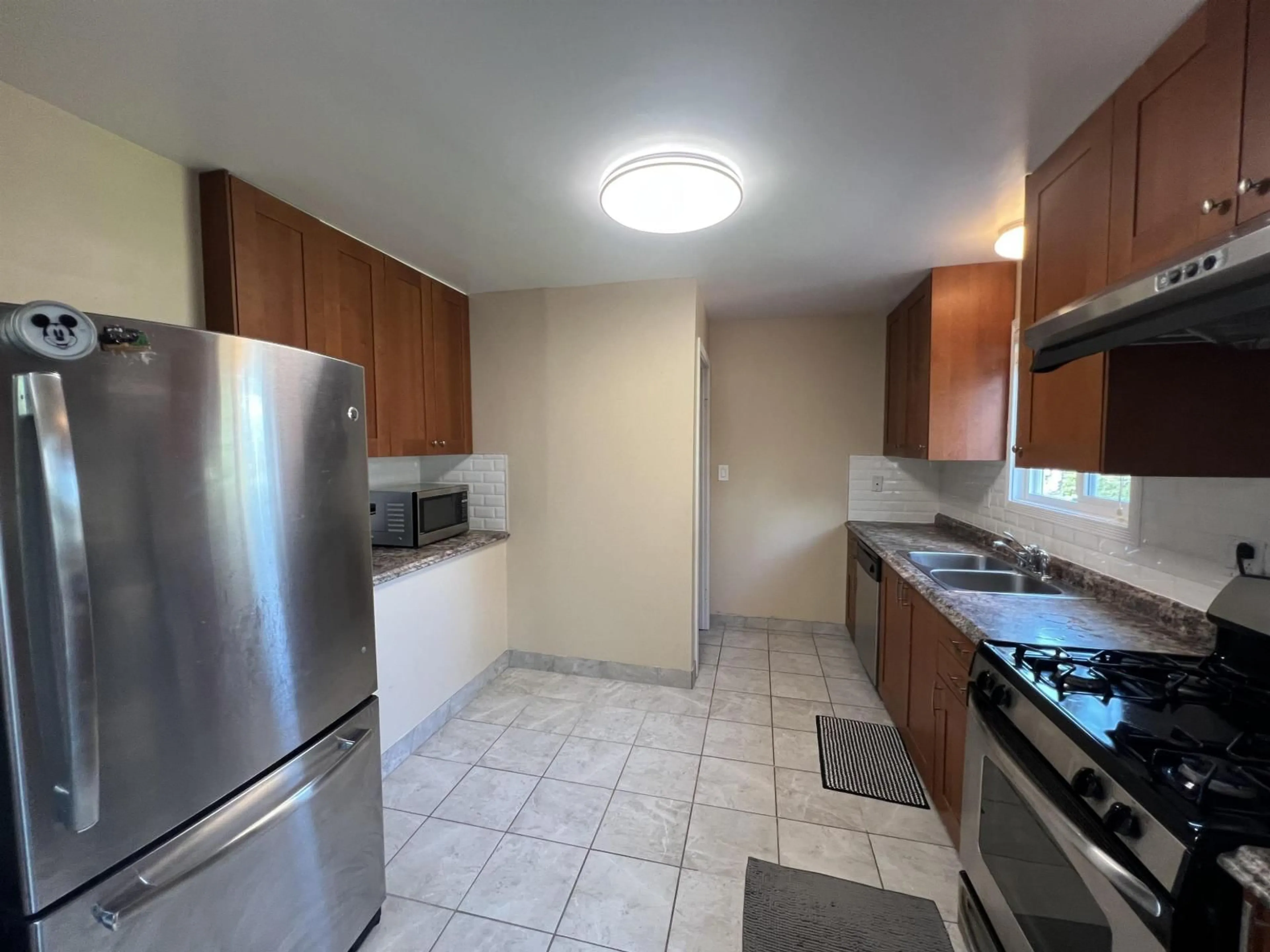 Standard kitchen, ceramic/tile floor for 6358 REID ROAD, Chilliwack British Columbia V2R3H1