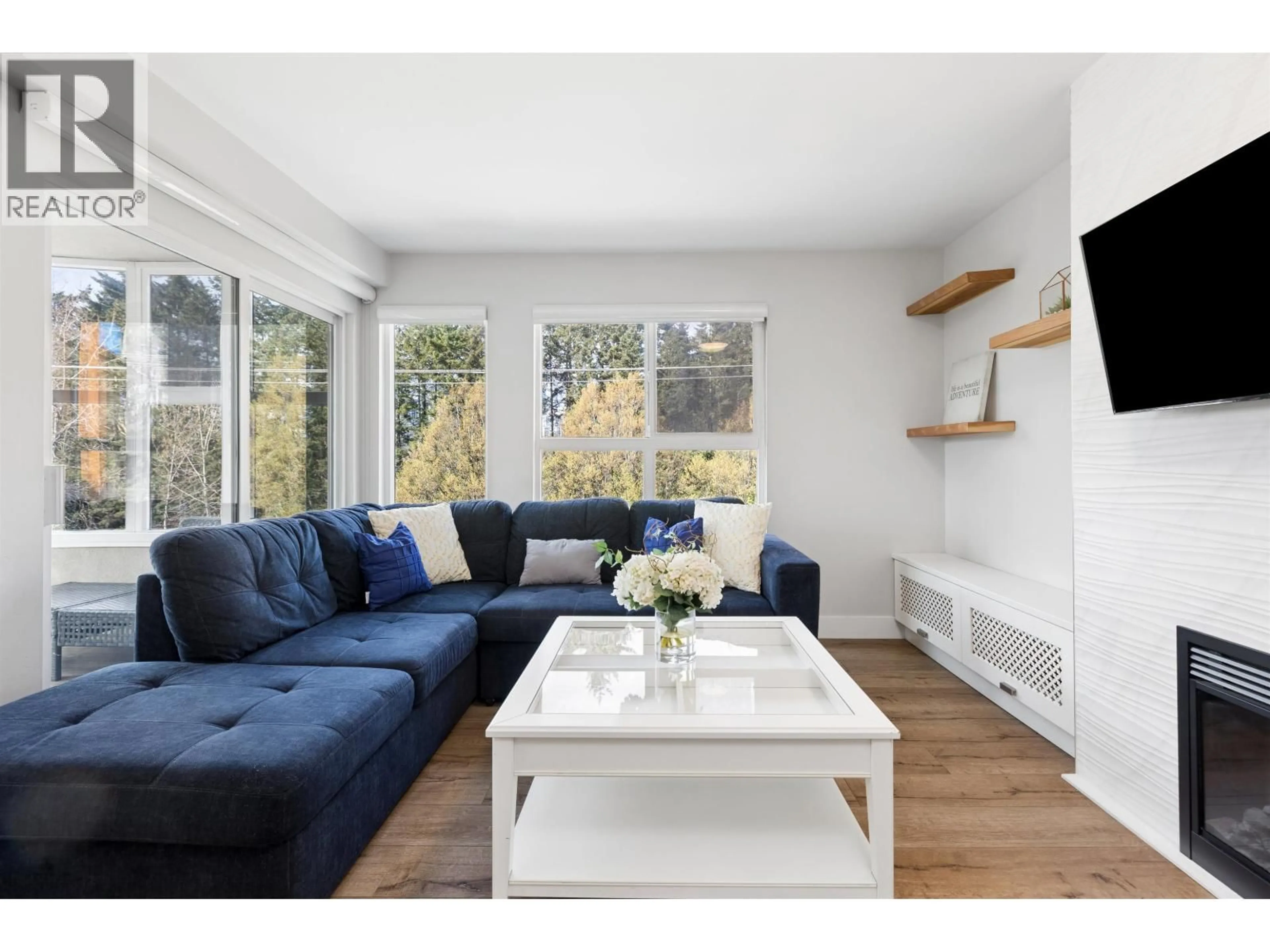 Living room with furniture, wood/laminate floor for 302 - 874 6TH AVENUE, Vancouver British Columbia V5Z1A6