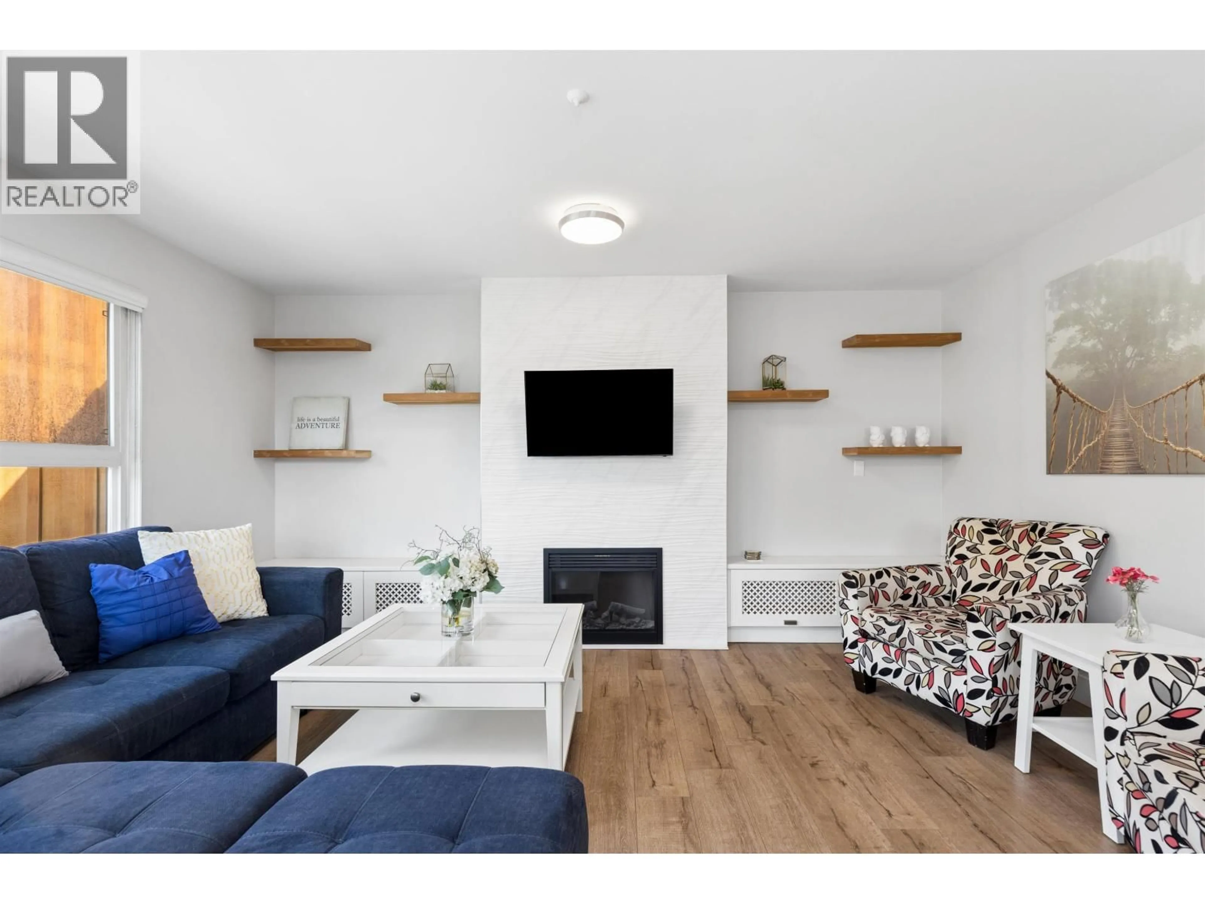 Living room with furniture, wood/laminate floor for 302 - 874 6TH AVENUE, Vancouver British Columbia V5Z1A6