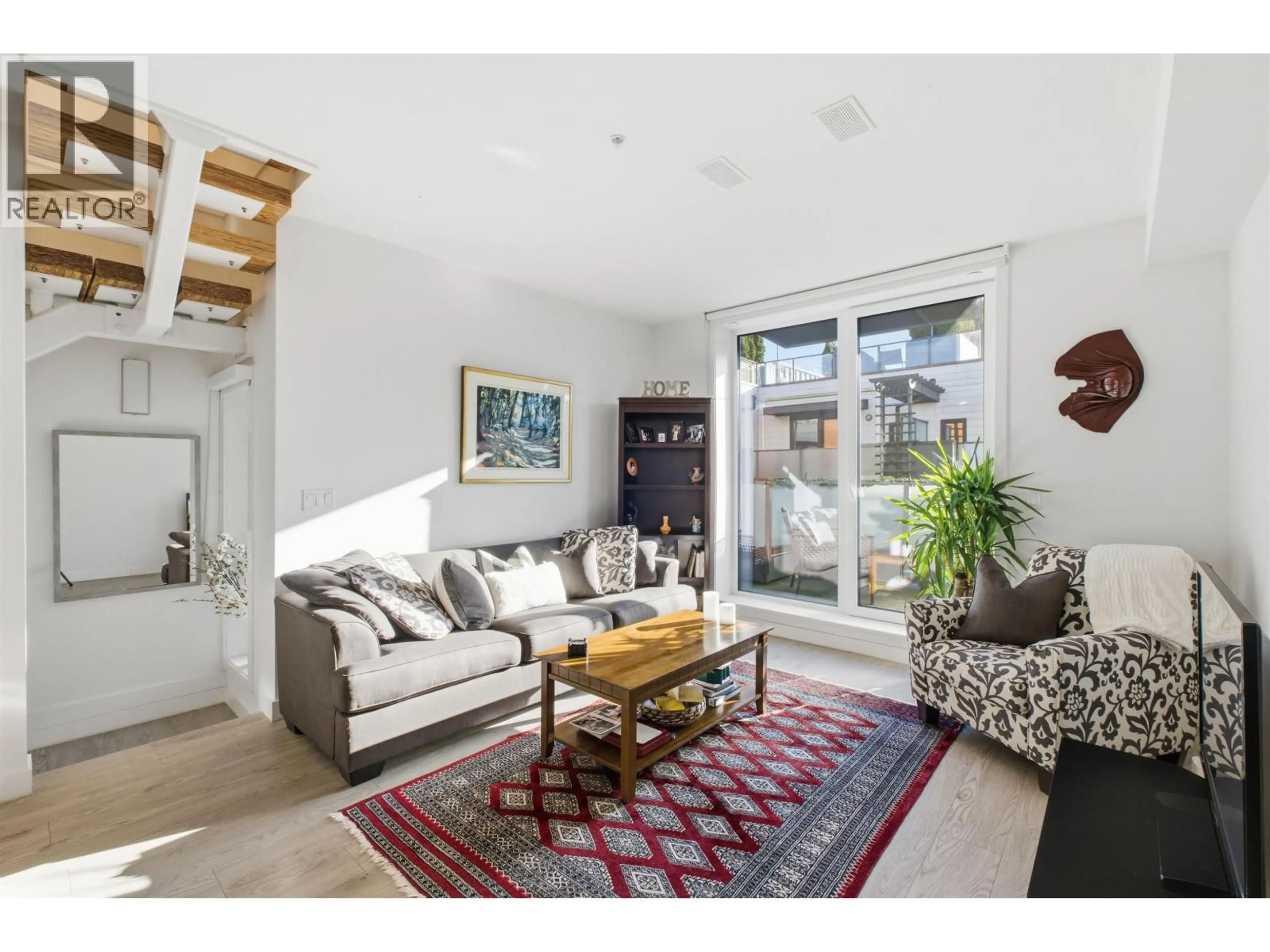 Living room with furniture, unknown for 33 - 720 3RD STREET, North Vancouver British Columbia V7L0G7