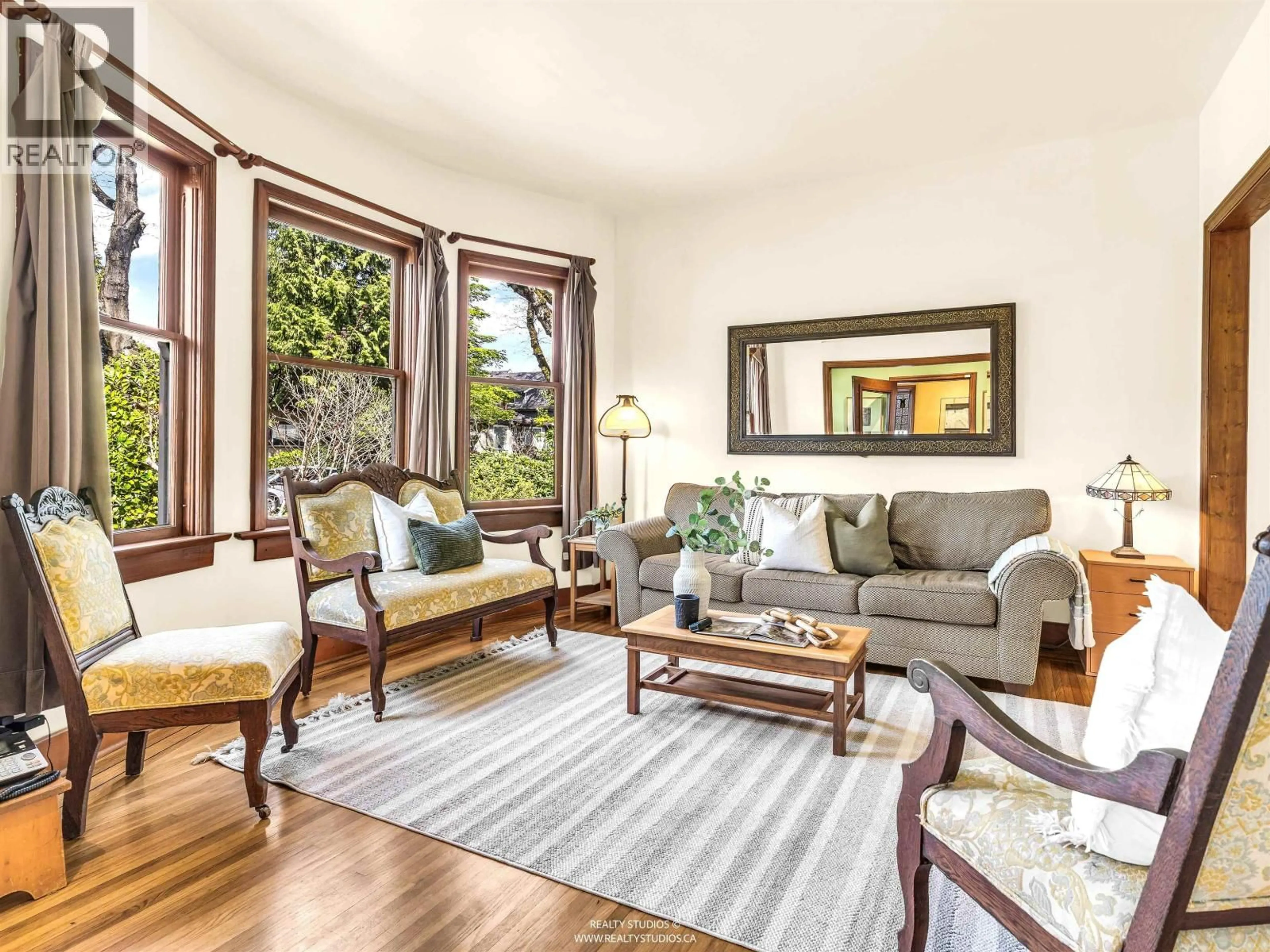 Living room with furniture, wood/laminate floor for 1756 7TH AVENUE, Vancouver British Columbia V5N1S2