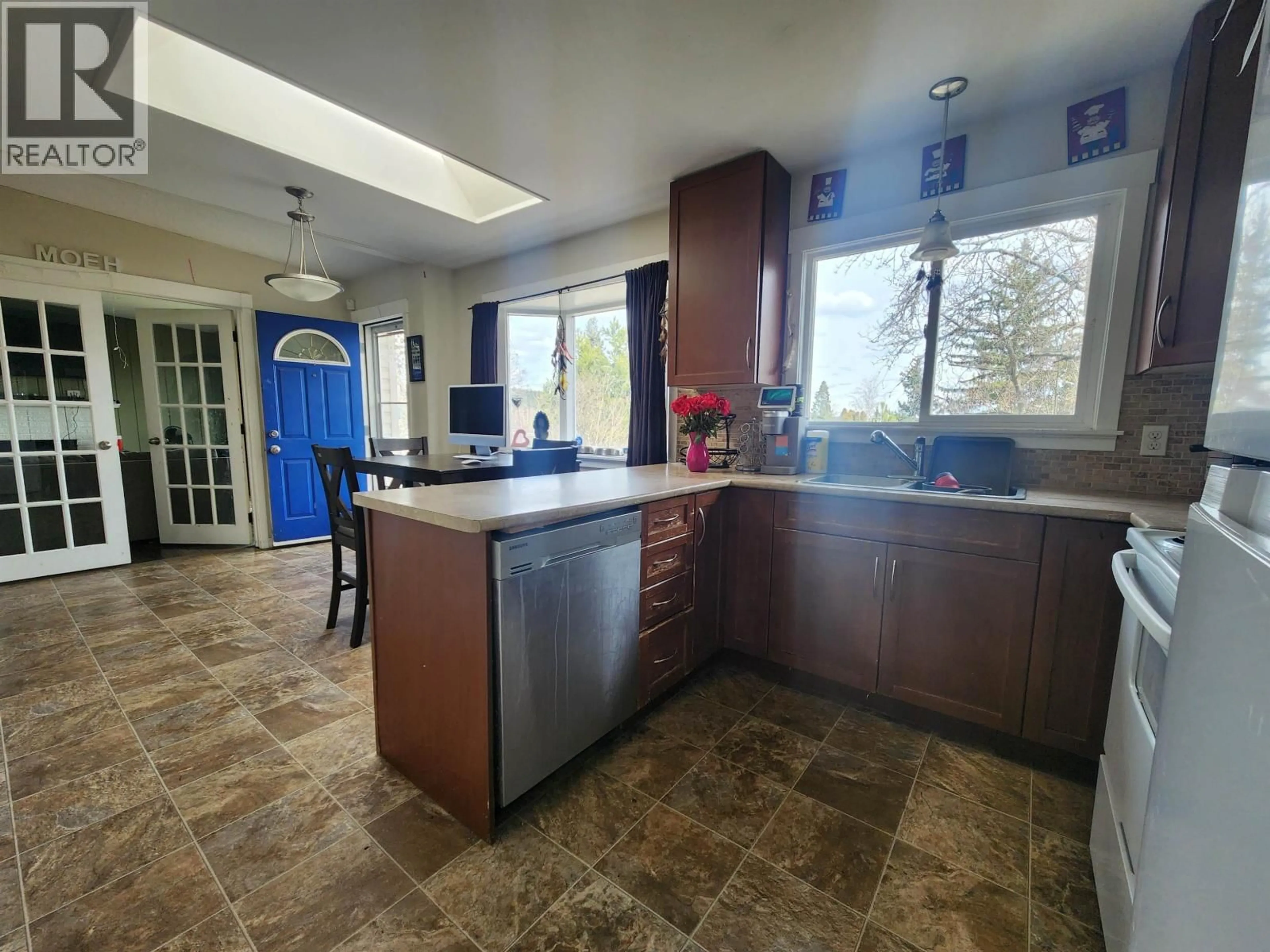 Open concept kitchen, ceramic/tile floor for 411 LYON STREET, Prince George British Columbia V2M3K9