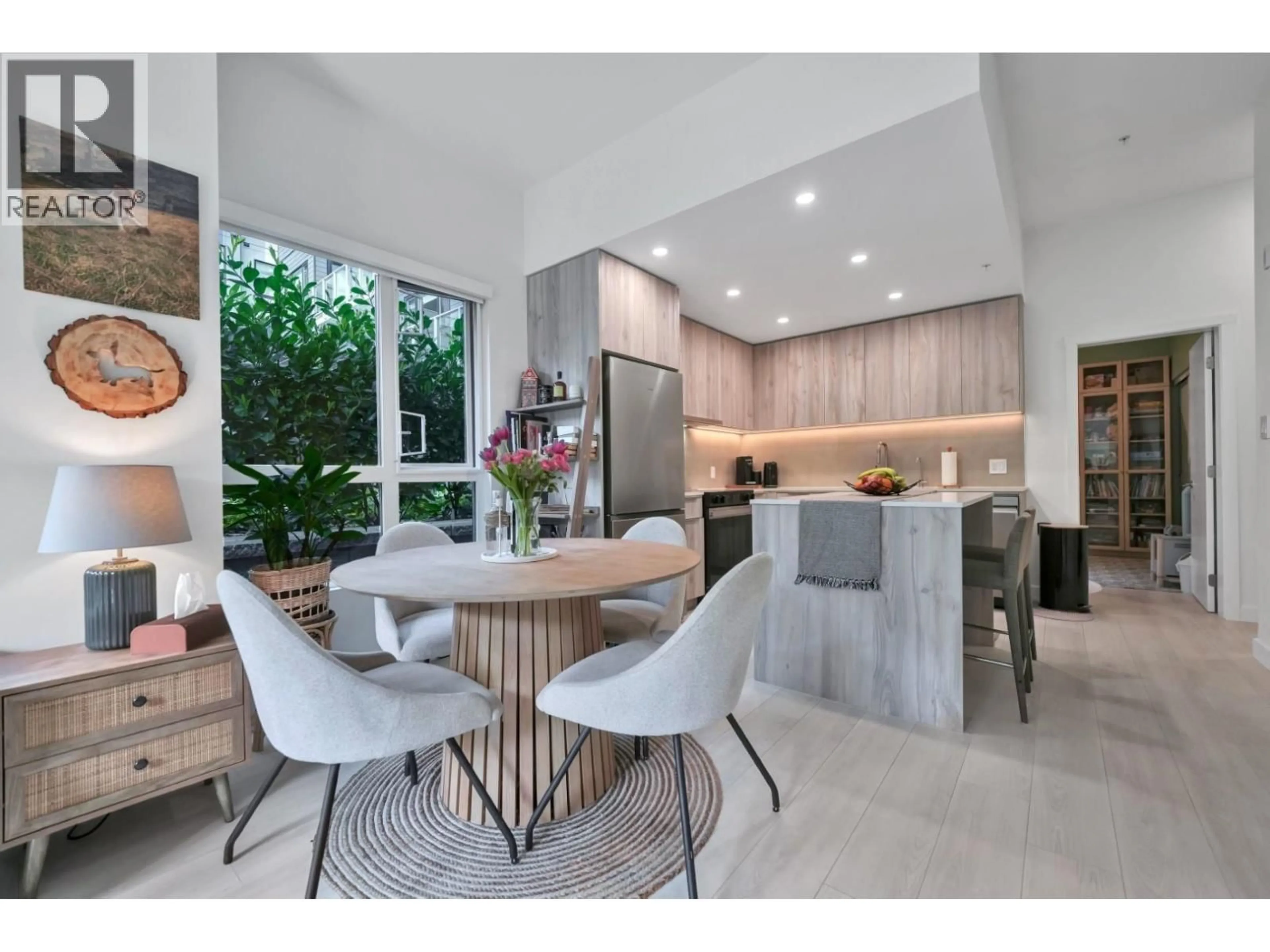 Open concept kitchen, unknown for 101 - 3596 MALSUM DRIVE, North Vancouver British Columbia V7G0B5