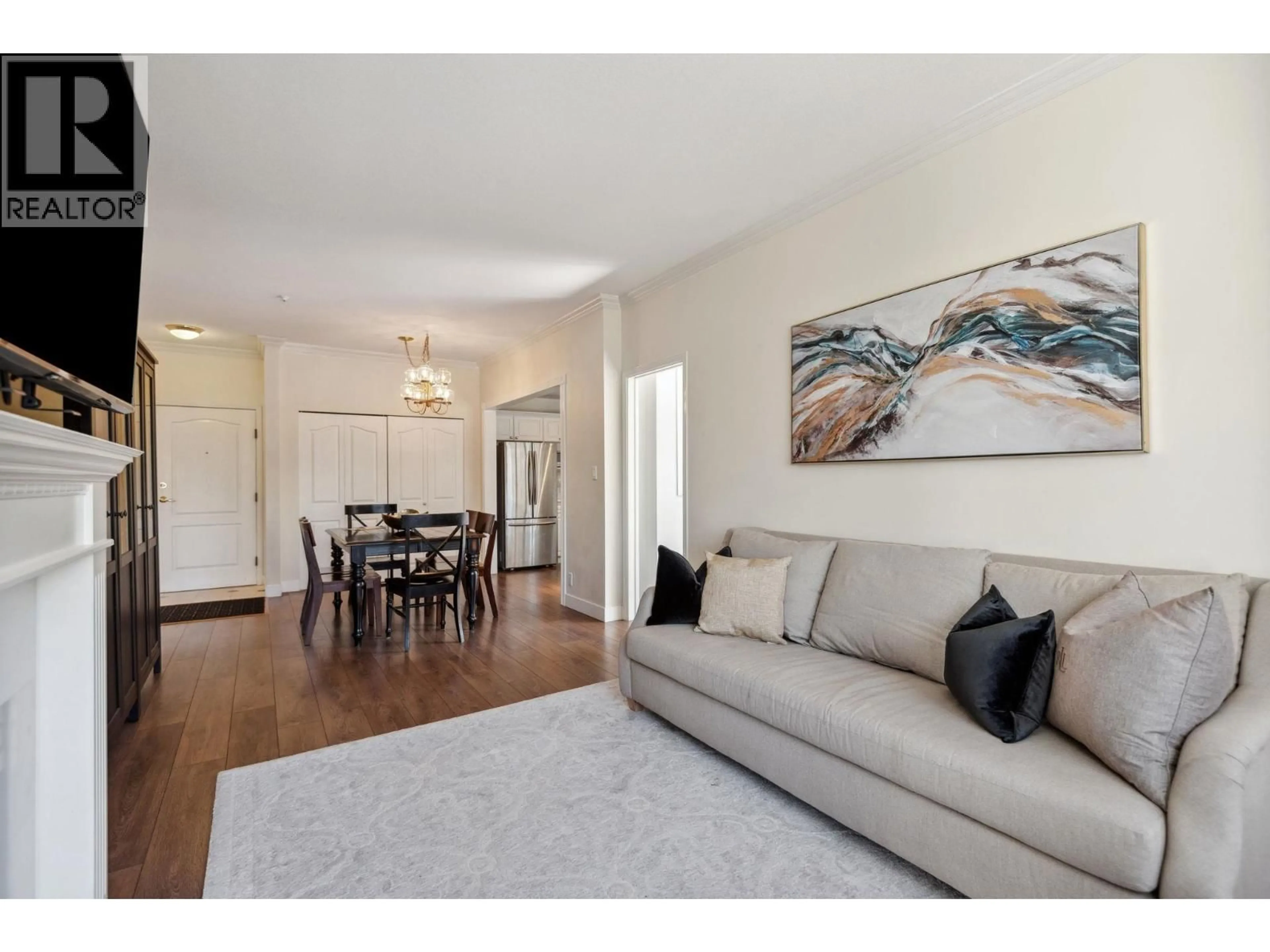 Living room with furniture, wood/laminate floor for 216 - 5735 HAMPTON PLACE, Vancouver British Columbia V6T2G8