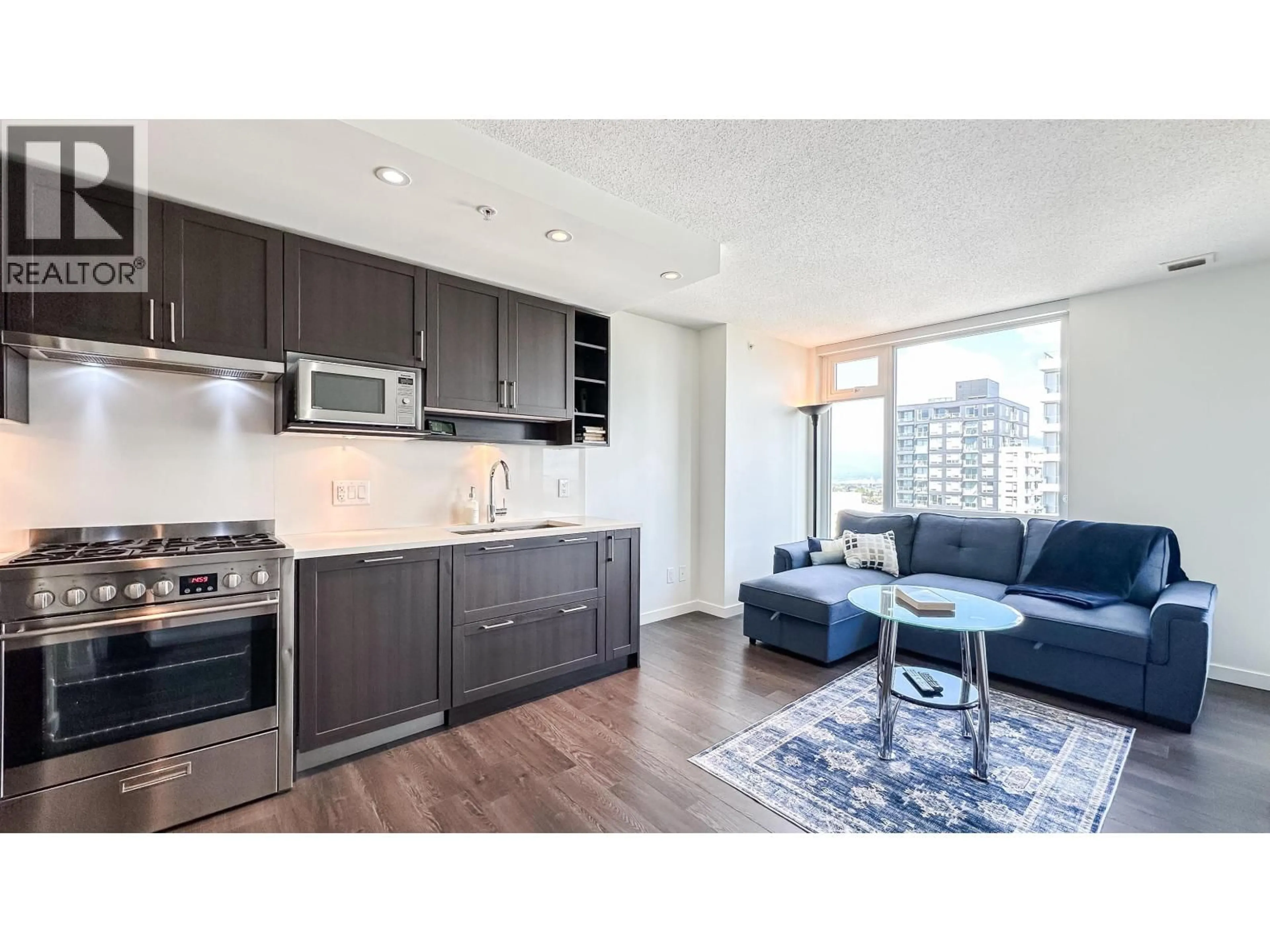 Open concept kitchen, wood/laminate floor for 2703 - 5665 BOUNDARY ROAD, Vancouver British Columbia V5R0E4