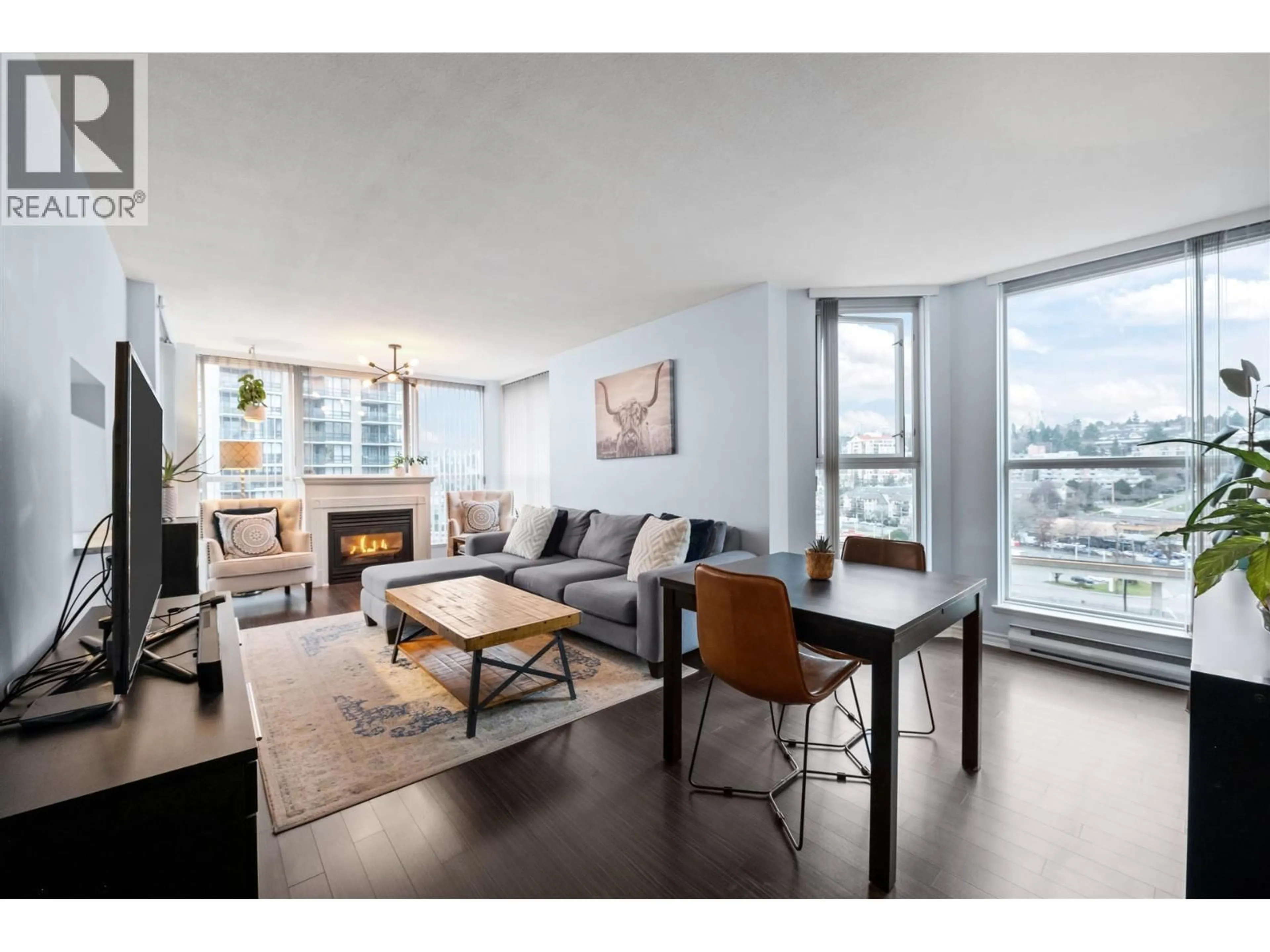 Living room with furniture, wood/laminate floor for 1006 - 10 LAGUNA COURT, New Westminster British Columbia V3M6W3