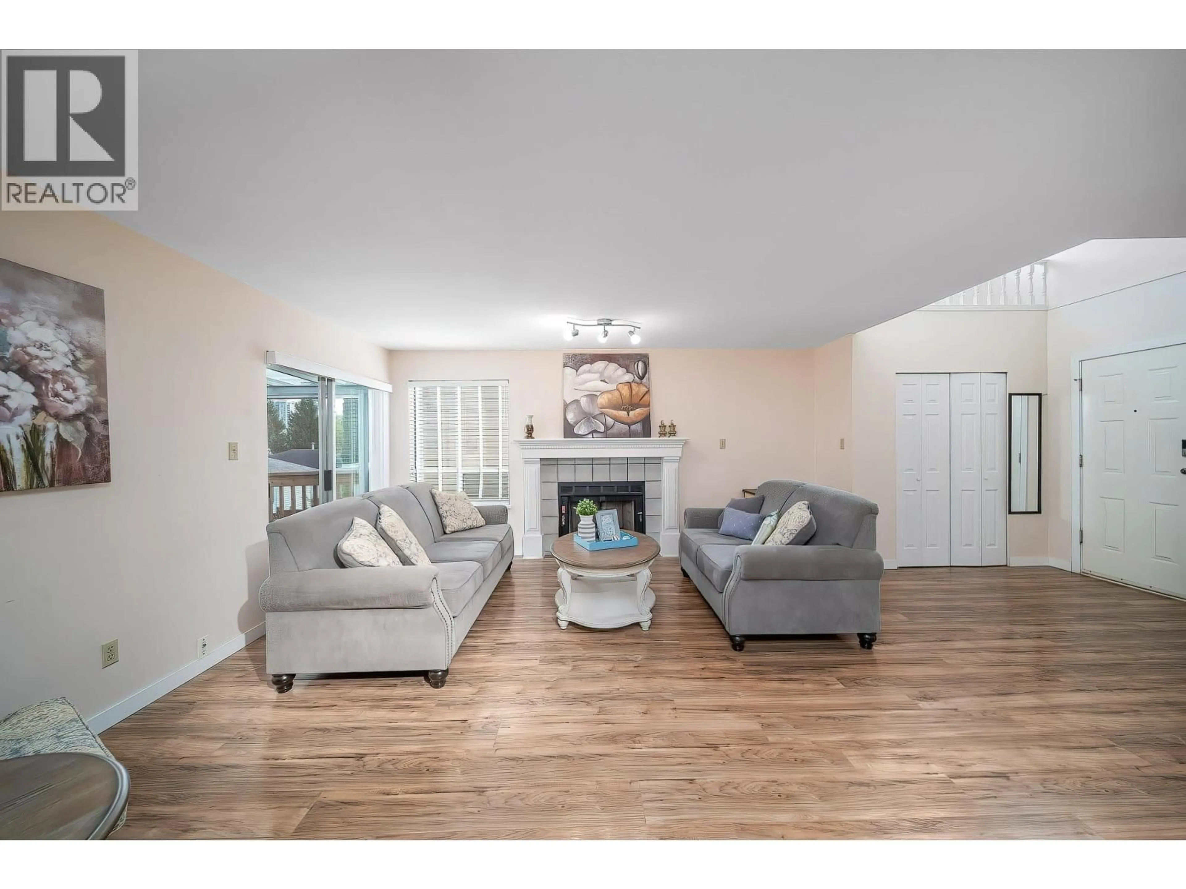 Living room with furniture, wood/laminate floor for 1269 MICHIGAN DRIVE, Coquitlam British Columbia V3B6T7