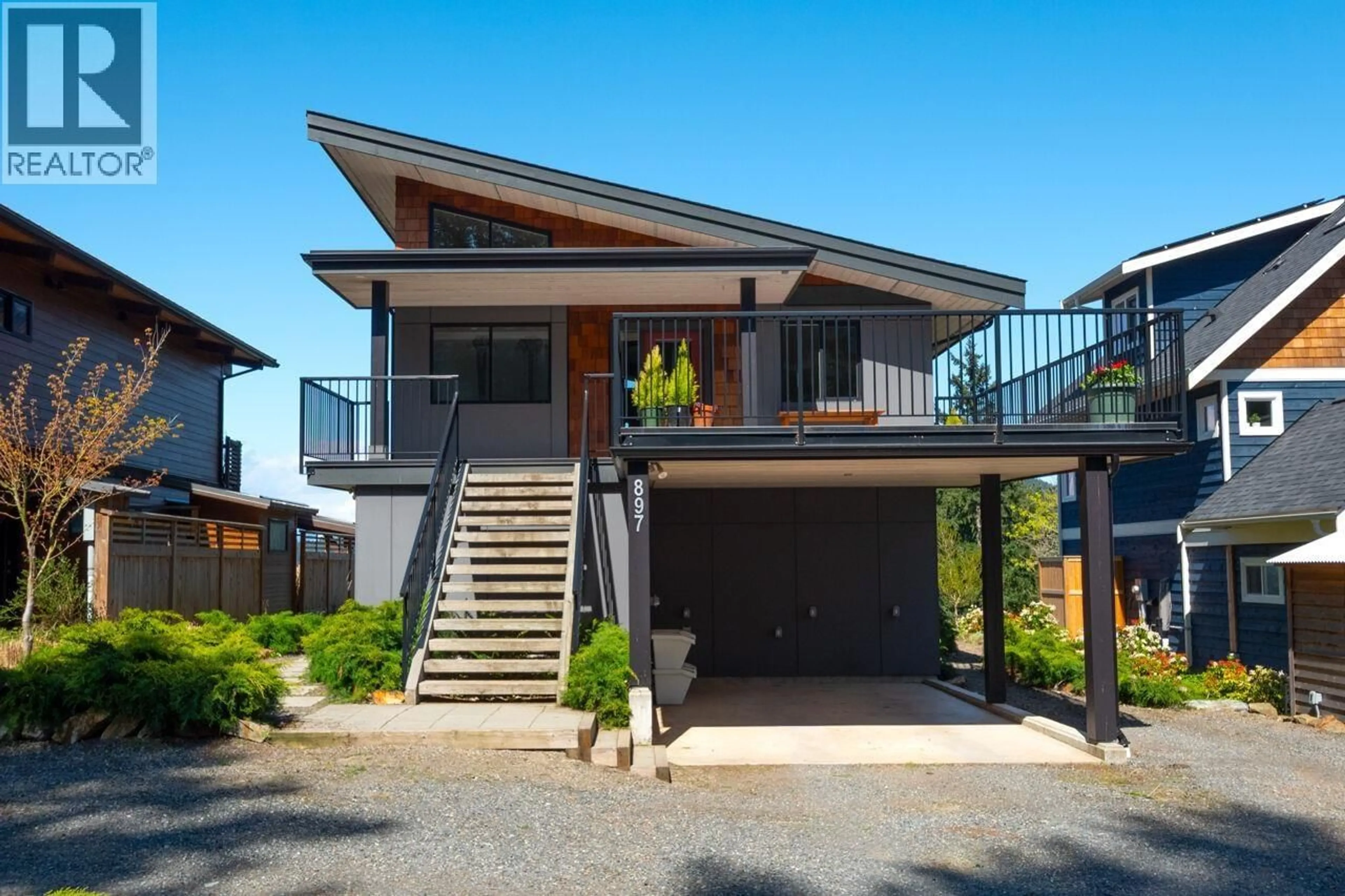 Home with brick exterior material, street for 897 RIVENDELL DRIVE, Bowen Island British Columbia V0N1G1