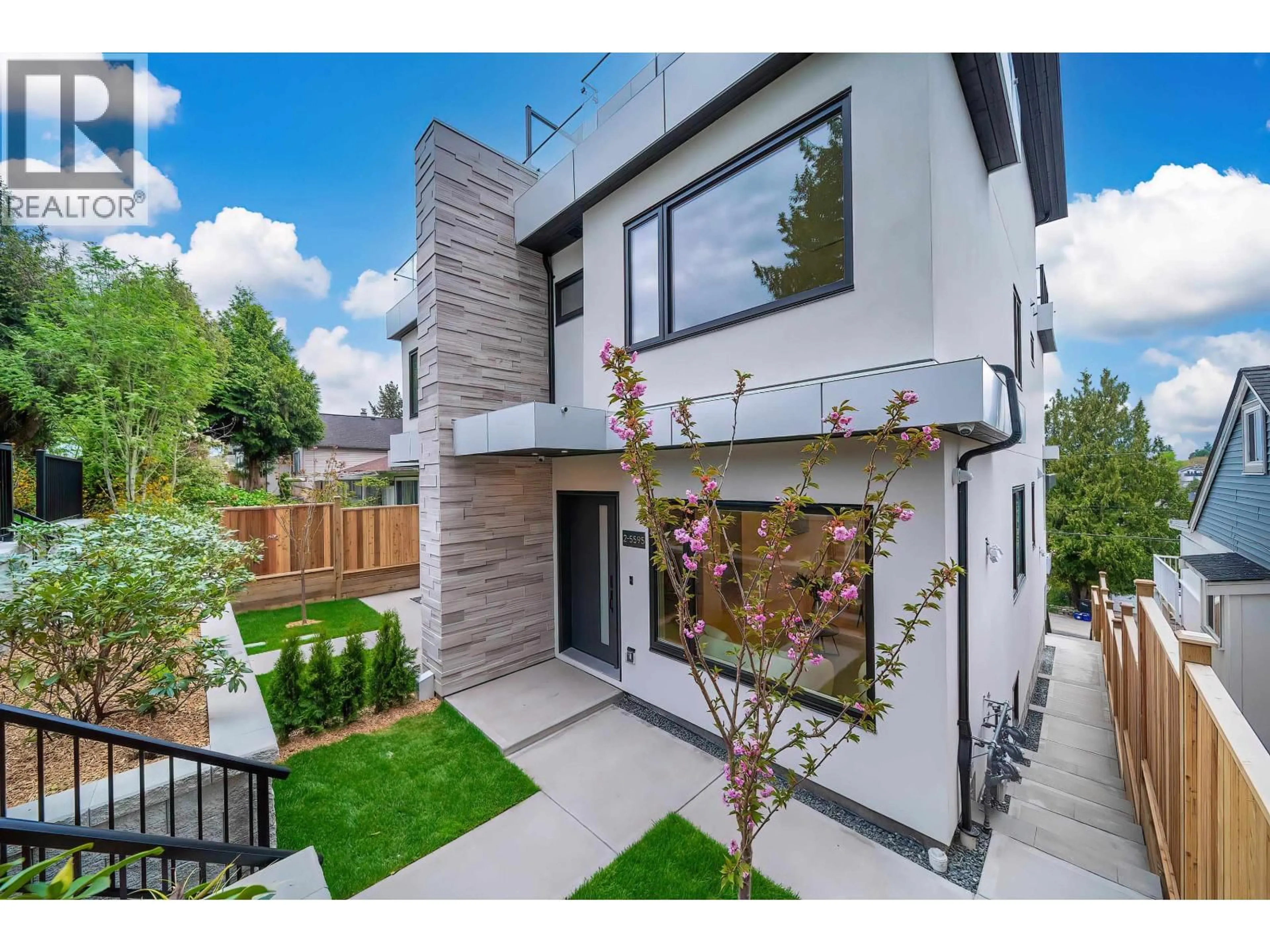 Home with brick exterior material, street for 2 - 5595 FLEMING STREET, Vancouver British Columbia V5P3G1