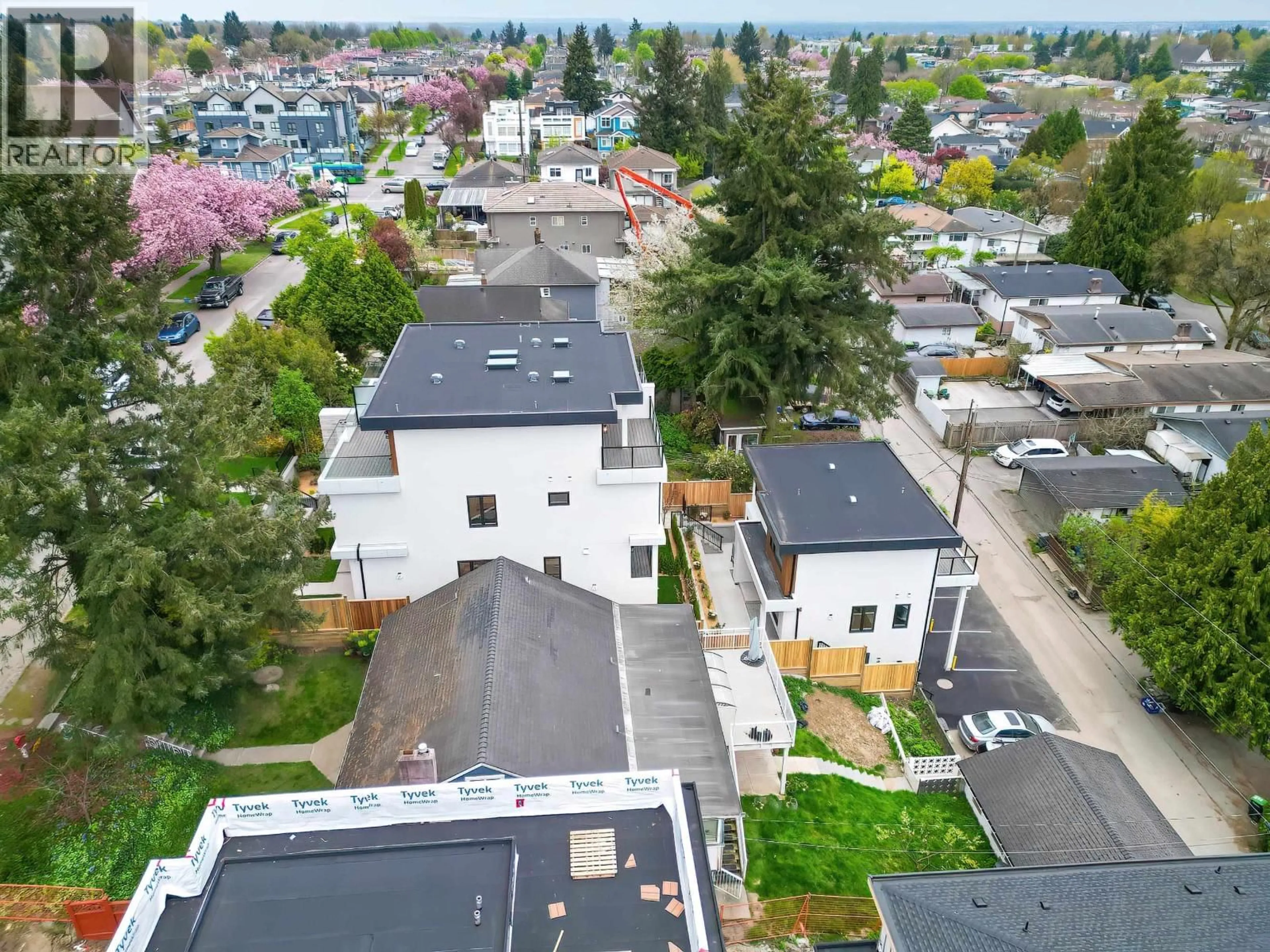 A pic from outside/outdoor area/front of a property/back of a property/a pic from drone, street for 2 - 5595 FLEMING STREET, Vancouver British Columbia V5P3G1