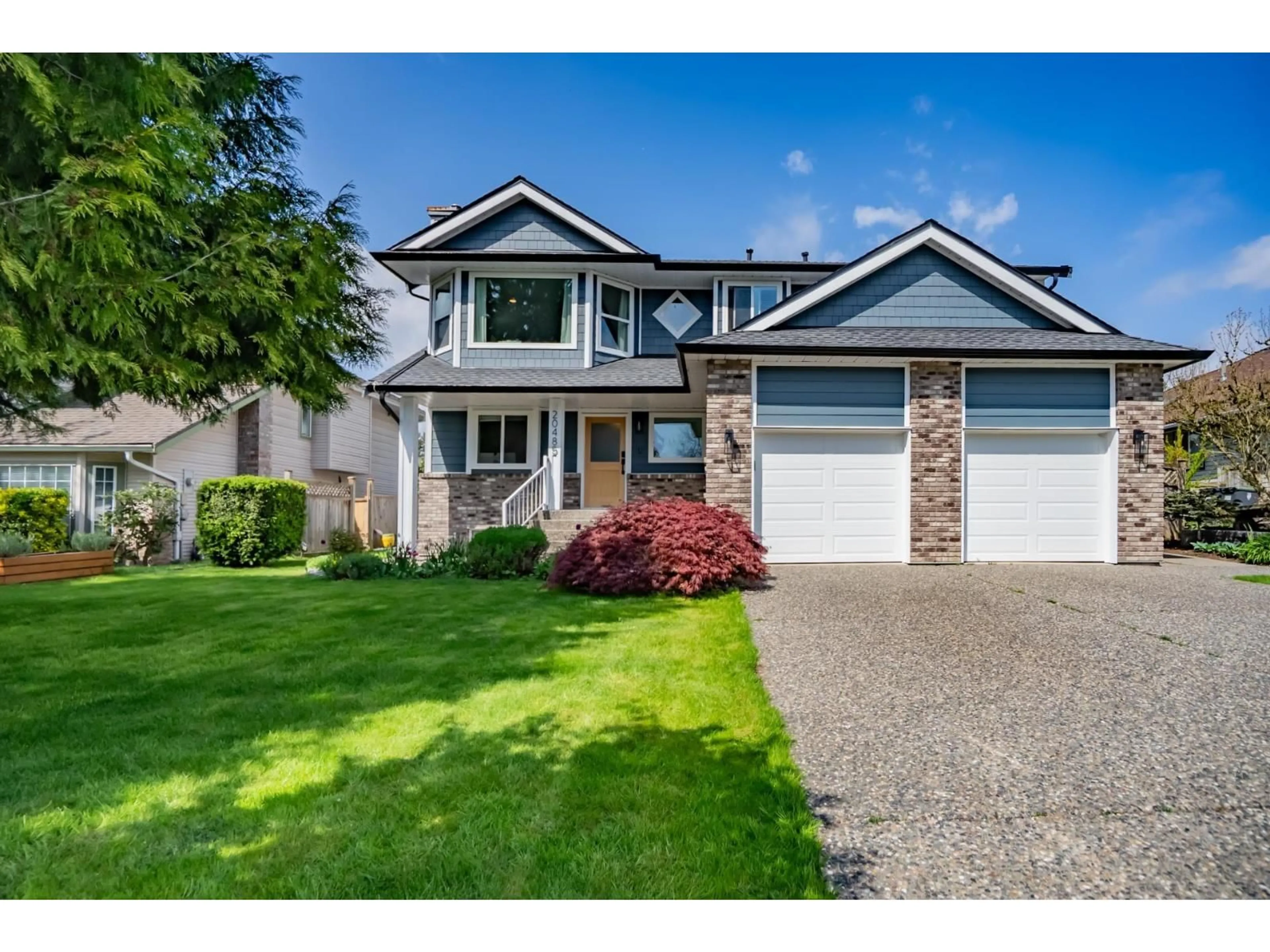 Home with vinyl exterior material, street for 20485 97B AVENUE, Langley British Columbia V1M2K1