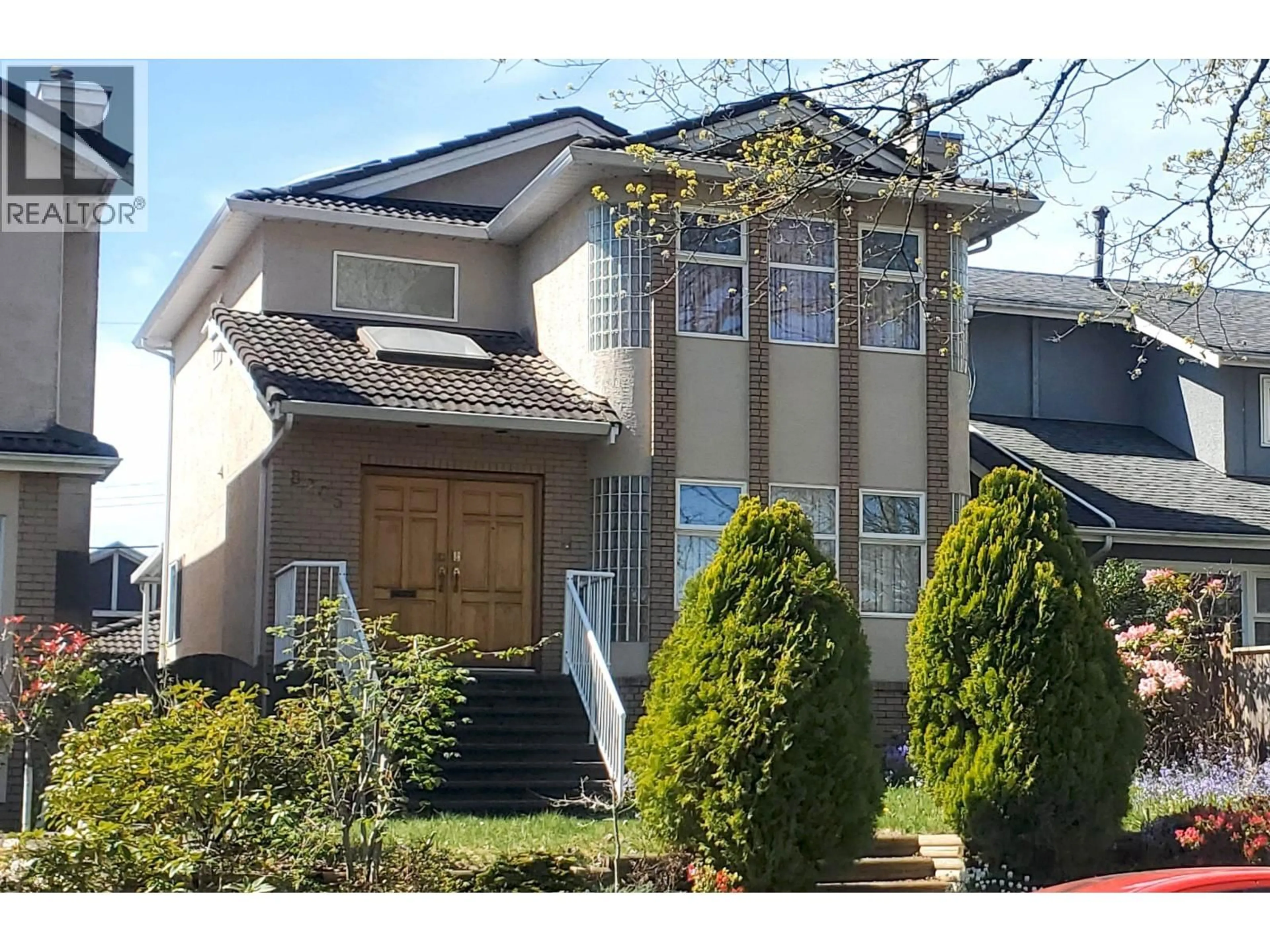 Home with vinyl exterior material, street for 8205 HUDSON STREET, Vancouver British Columbia V6P4M2