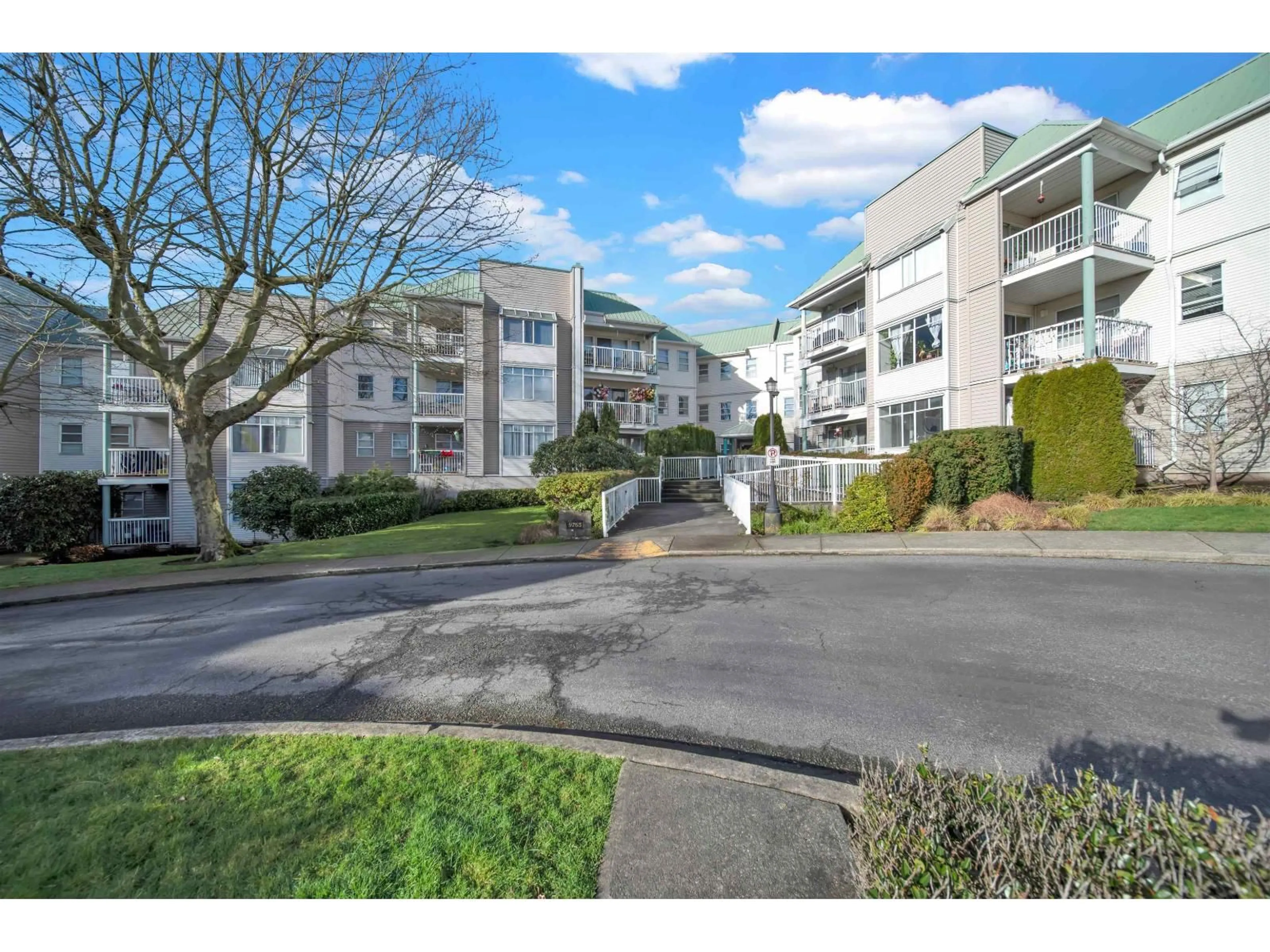 A pic from outside/outdoor area/front of a property/back of a property/a pic from drone, street for 102 - 9765 140 STREET, Surrey British Columbia V3T5S5