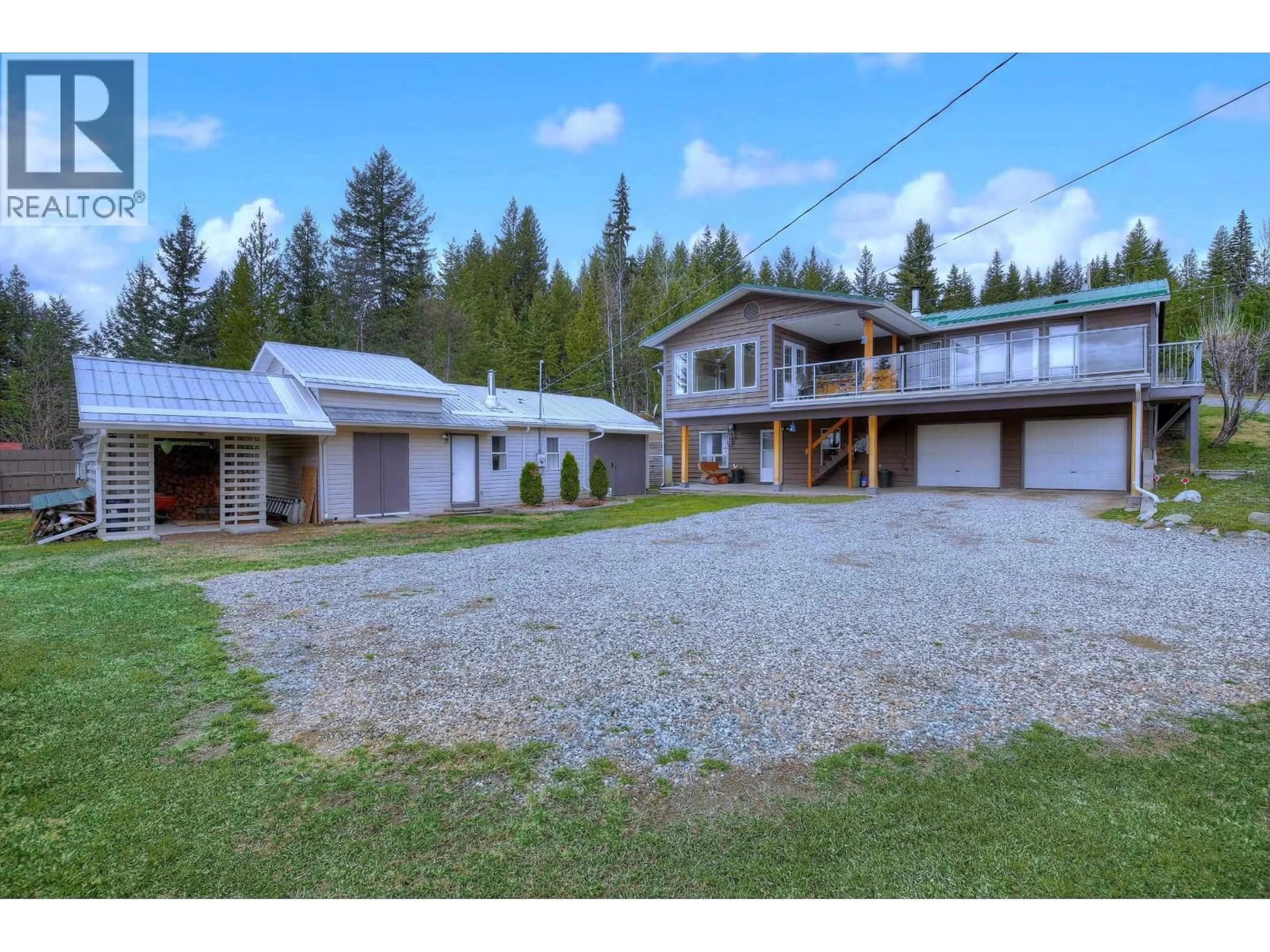 A pic from outside/outdoor area/front of a property/back of a property/a pic from drone, mountain view for 2391 STARLIKE LAKE ROAD, Horsefly British Columbia V0L1L0