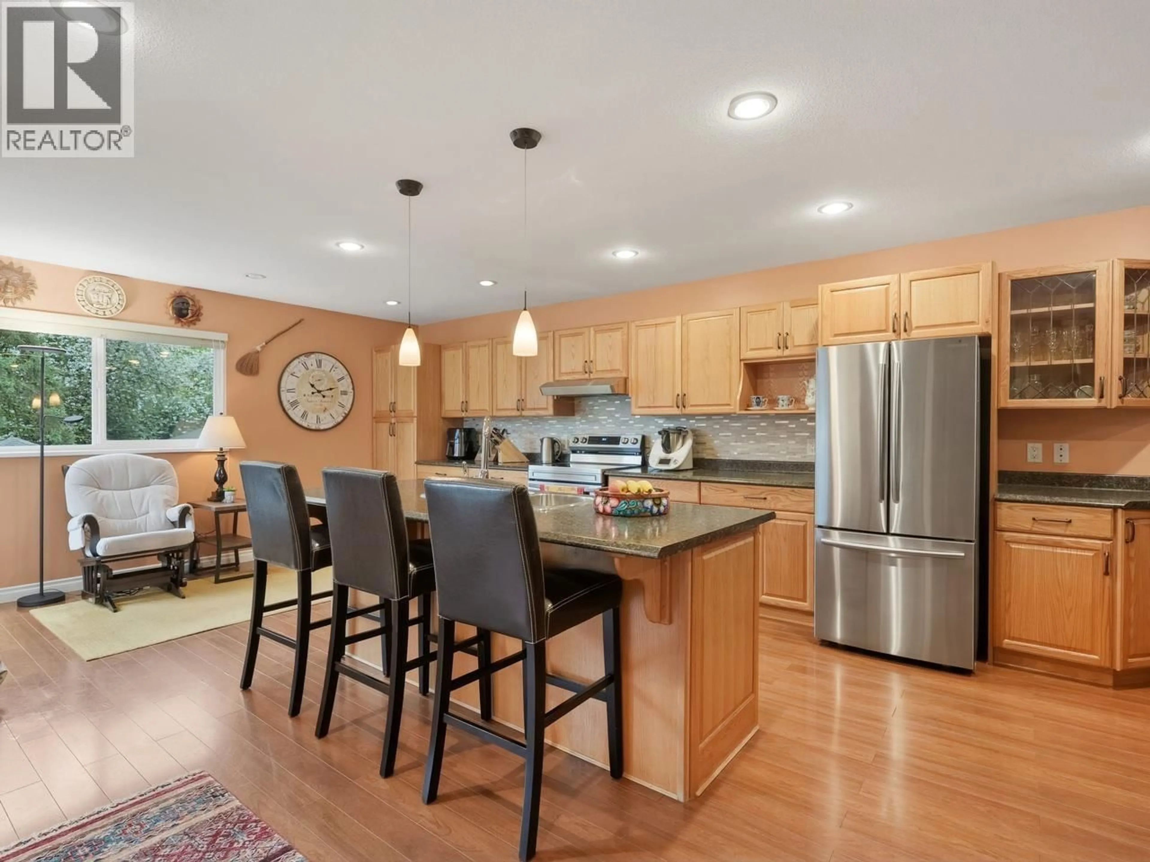 Open concept kitchen, wood/laminate floor for 9439 SNOWBERRY COURT, Burnaby British Columbia V5A4A6