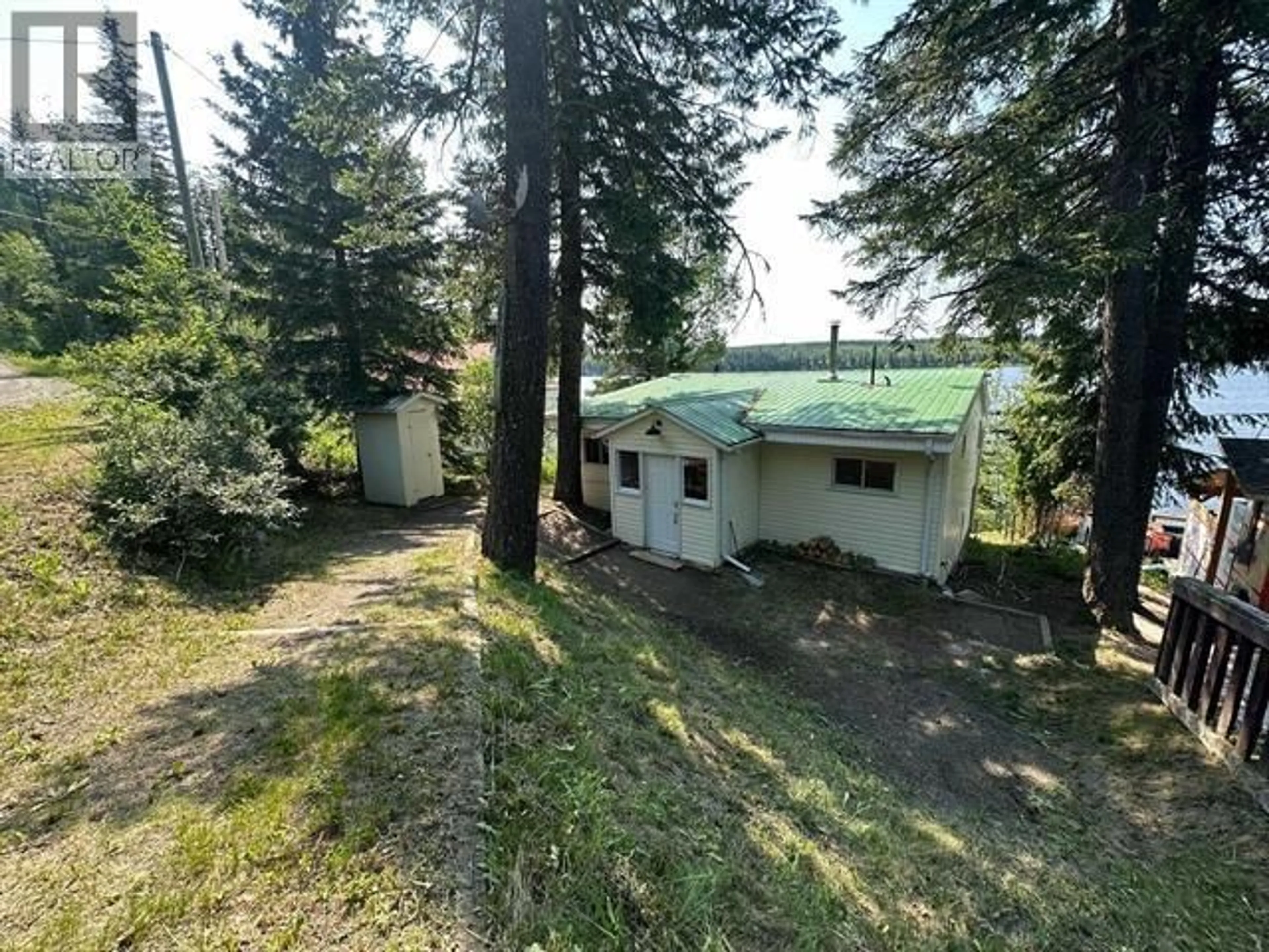 A pic from outside/outdoor area/front of a property/back of a property/a pic from drone, forest/trees view for 49815 TAPPING ROAD, Cluculz Lake British Columbia V0J3A3