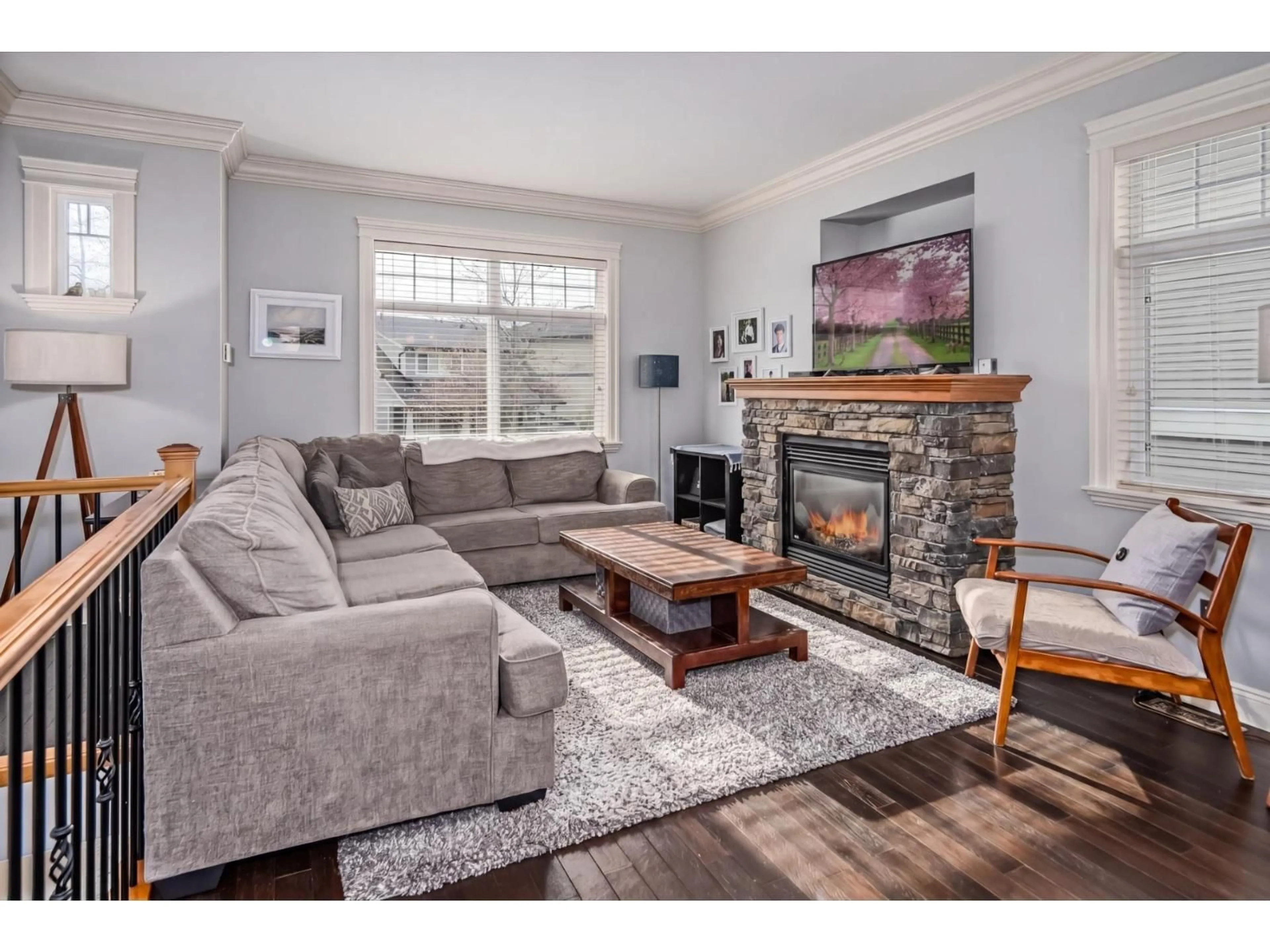 Living room with furniture, wood/laminate floor for 4364 MEIGHEN PLACE, Abbotsford British Columbia V3G0A8