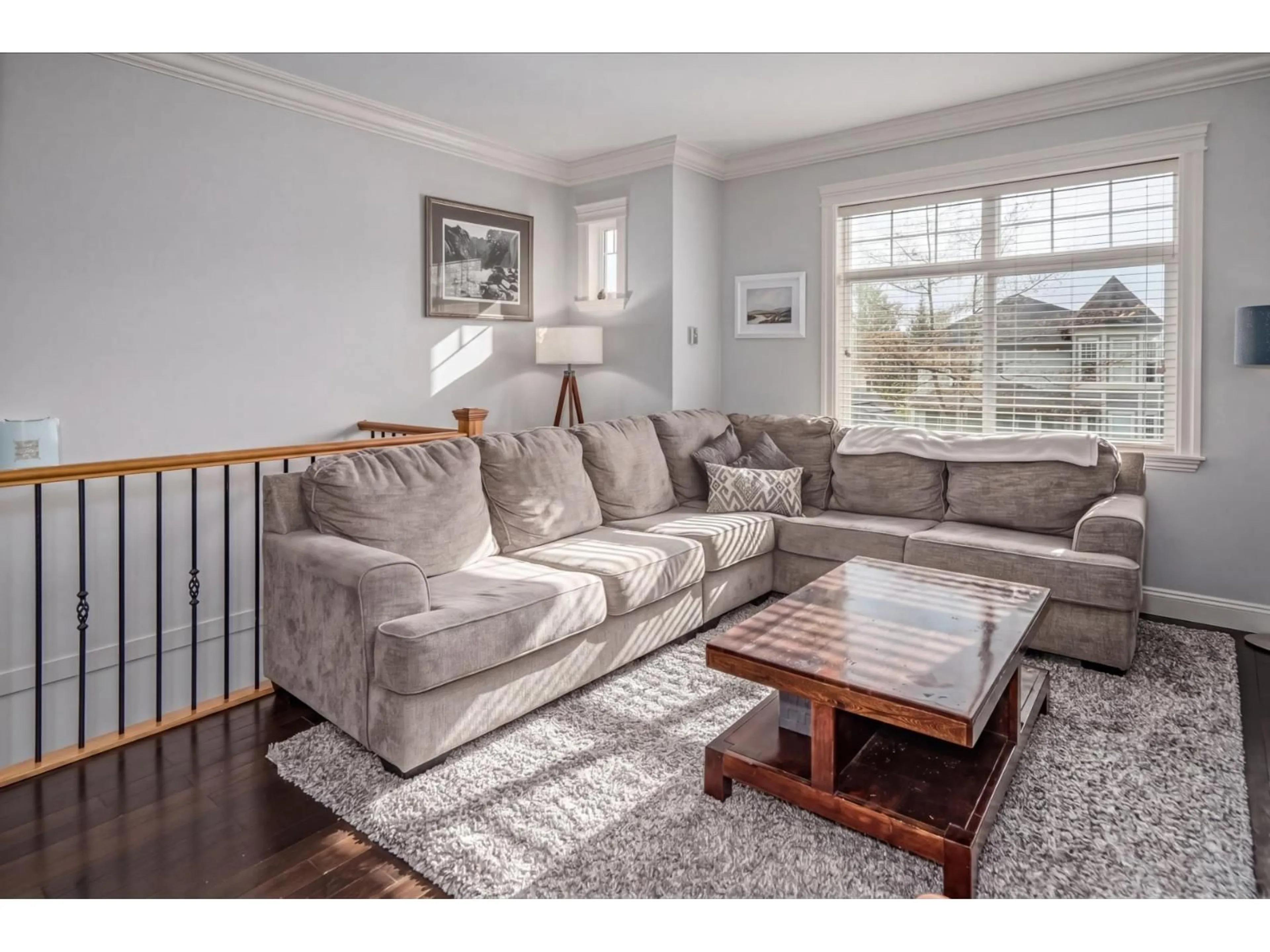 Living room with furniture, wood/laminate floor for 4364 MEIGHEN PLACE, Abbotsford British Columbia V3G0A8