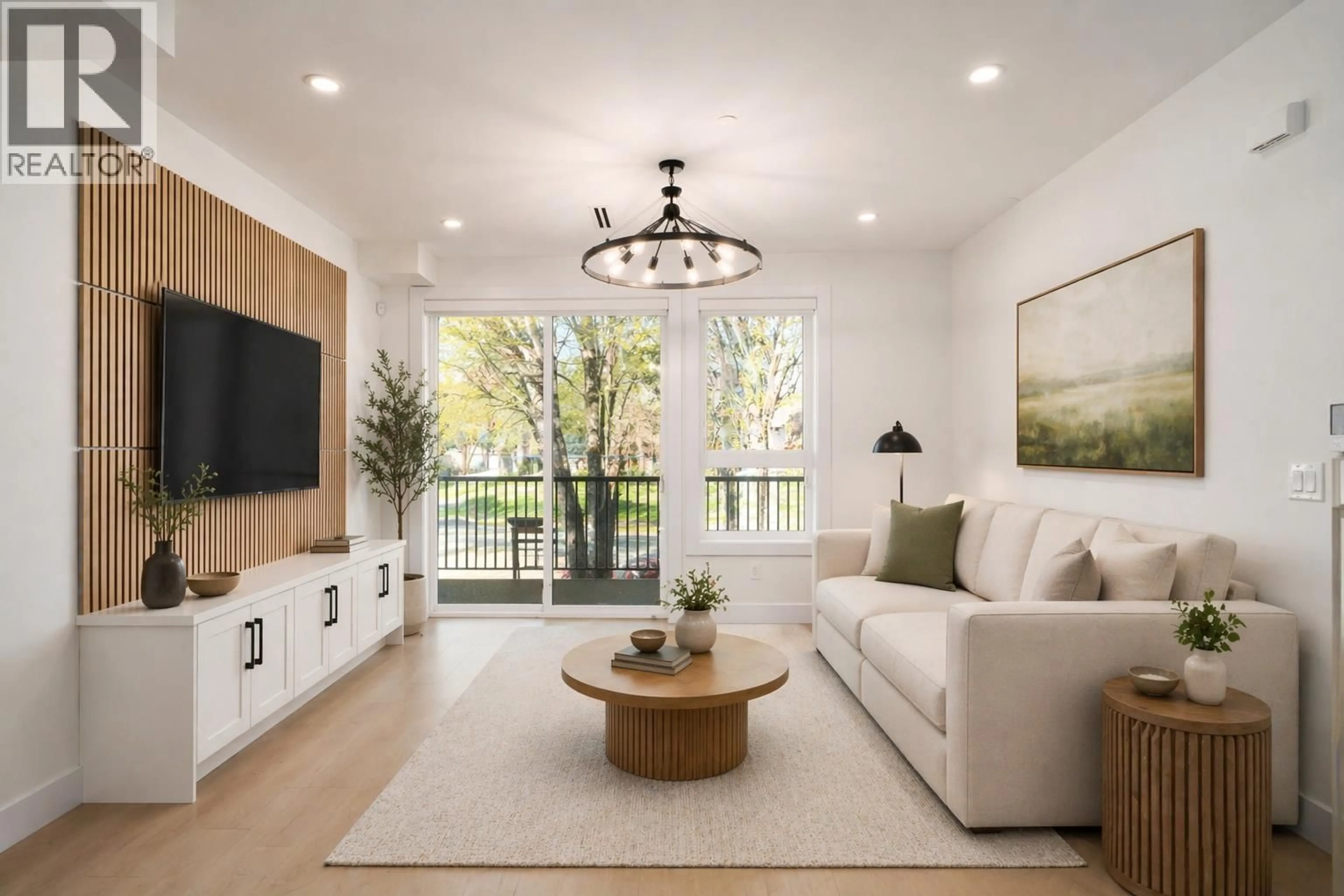 Living room with furniture, wood/laminate floor for 4830 DUCHESS STREET, Vancouver British Columbia V5R3L6