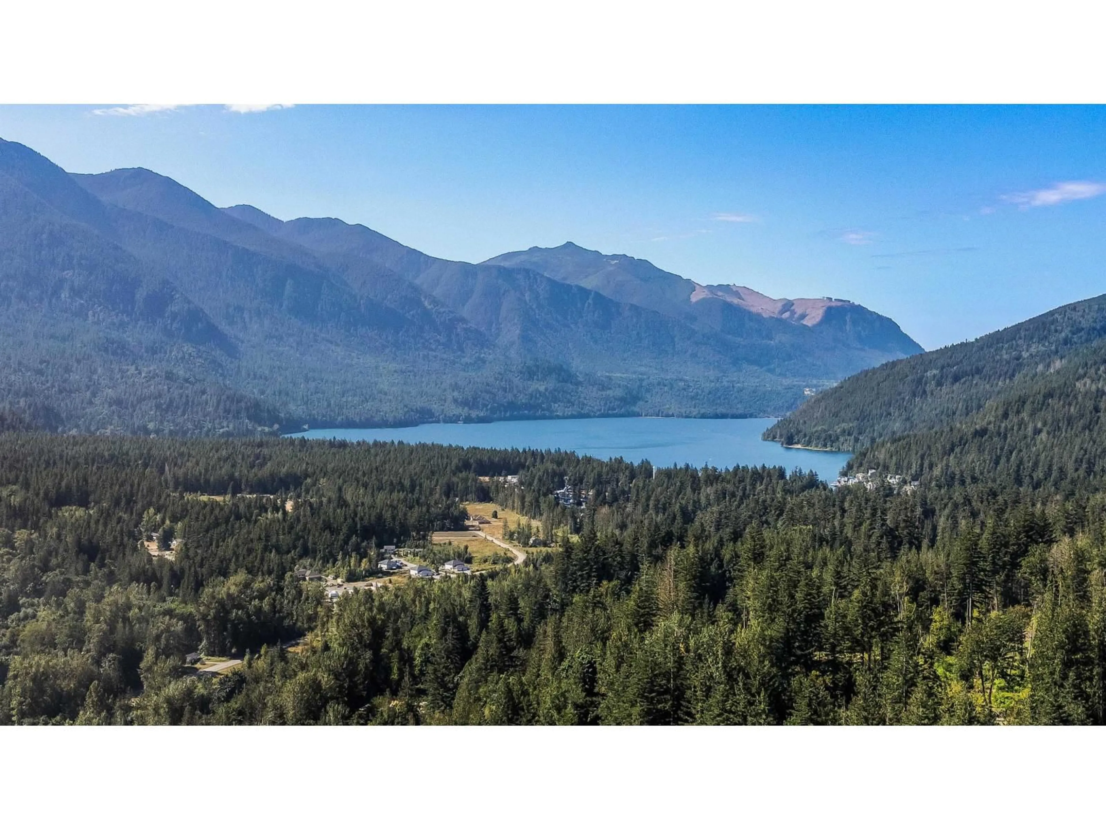 A pic from outside/outdoor area/front of a property/back of a property/a pic from drone, water/lake/river/ocean view for 1 - 45348 MAGDALENA PLACE, Cultus Lake British Columbia V2R0K7