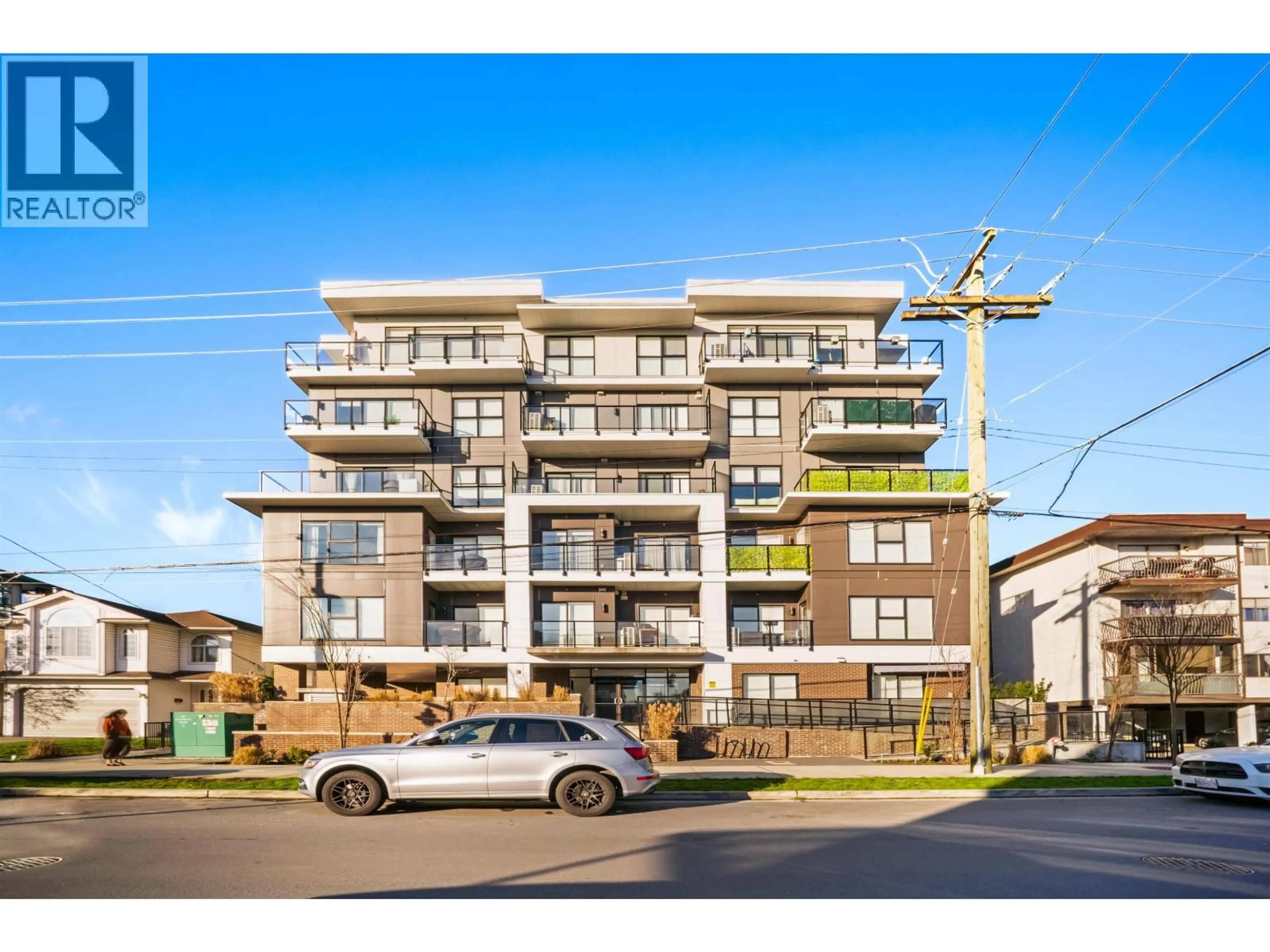 A pic from outside/outdoor area/front of a property/back of a property/a pic from drone, street for 404 - 2331 KELLY AVENUE, Port Coquitlam British Columbia V3C0T4