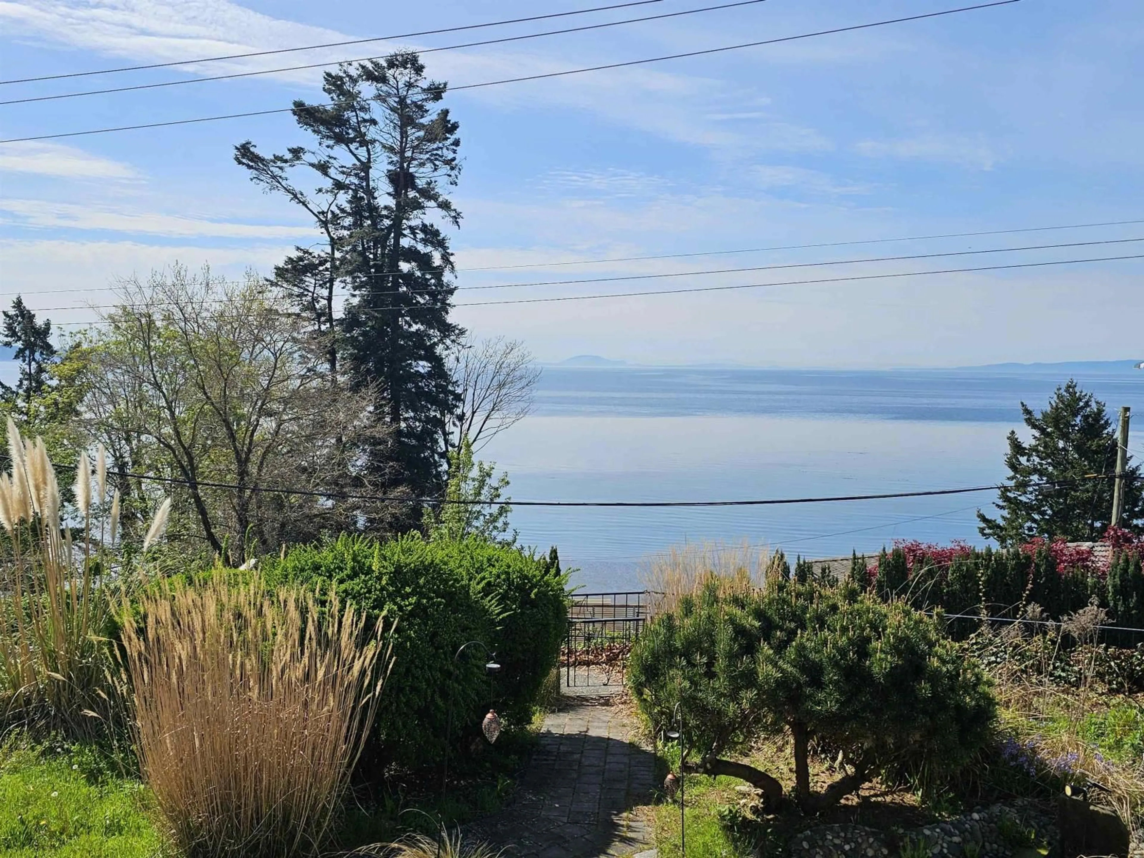 A pic from outside/outdoor area/front of a property/back of a property/a pic from drone, water/lake/river/ocean view for 14391 MARINE DRIVE, White Rock British Columbia V4B1B2