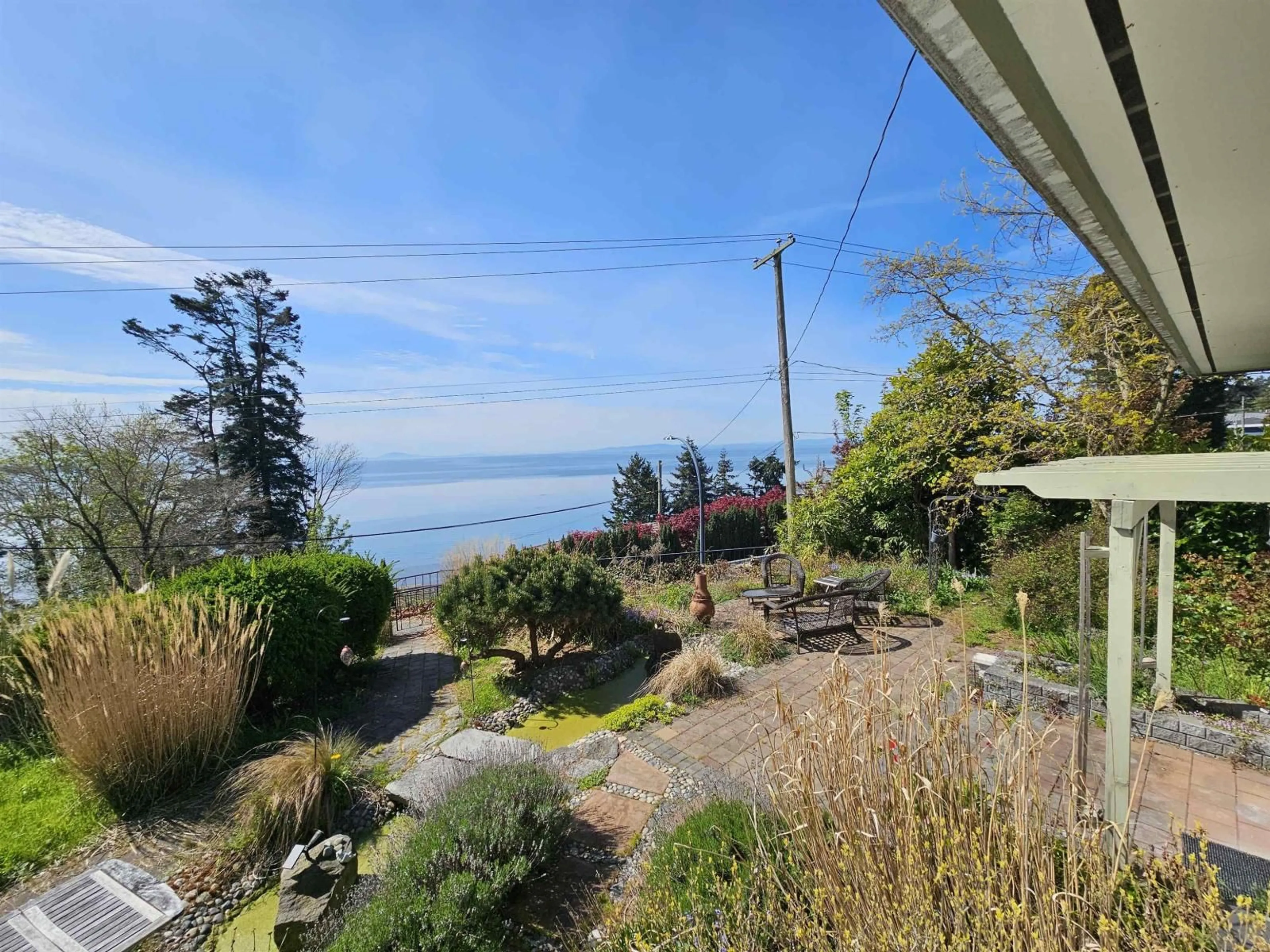A pic from outside/outdoor area/front of a property/back of a property/a pic from drone, water/lake/river/ocean view for 14391 MARINE DRIVE, White Rock British Columbia V4B1B2