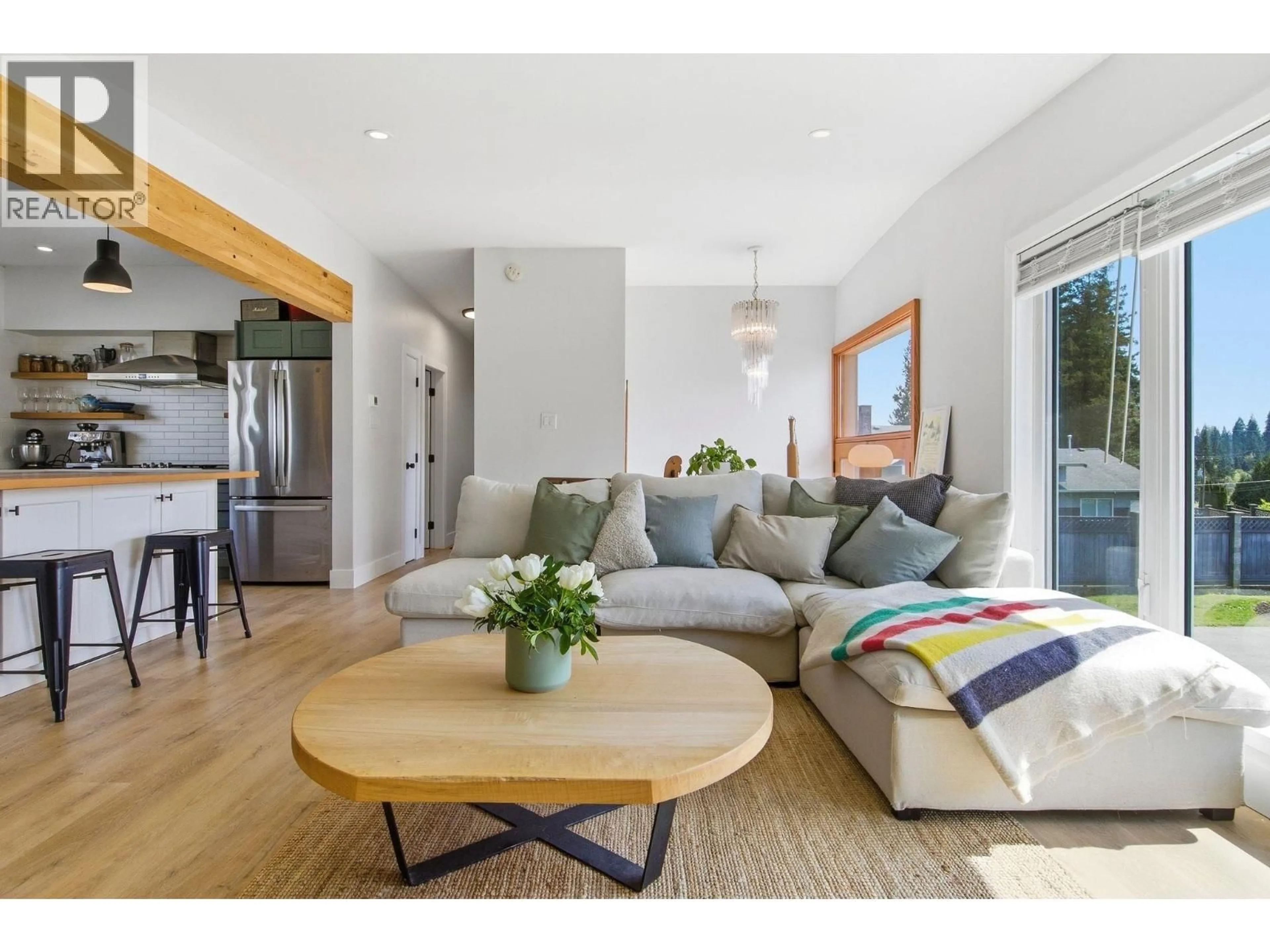 Living room with furniture, wood/laminate floor for 308 MOUNT ROYAL DRIVE, Port Moody British Columbia V3H1R1