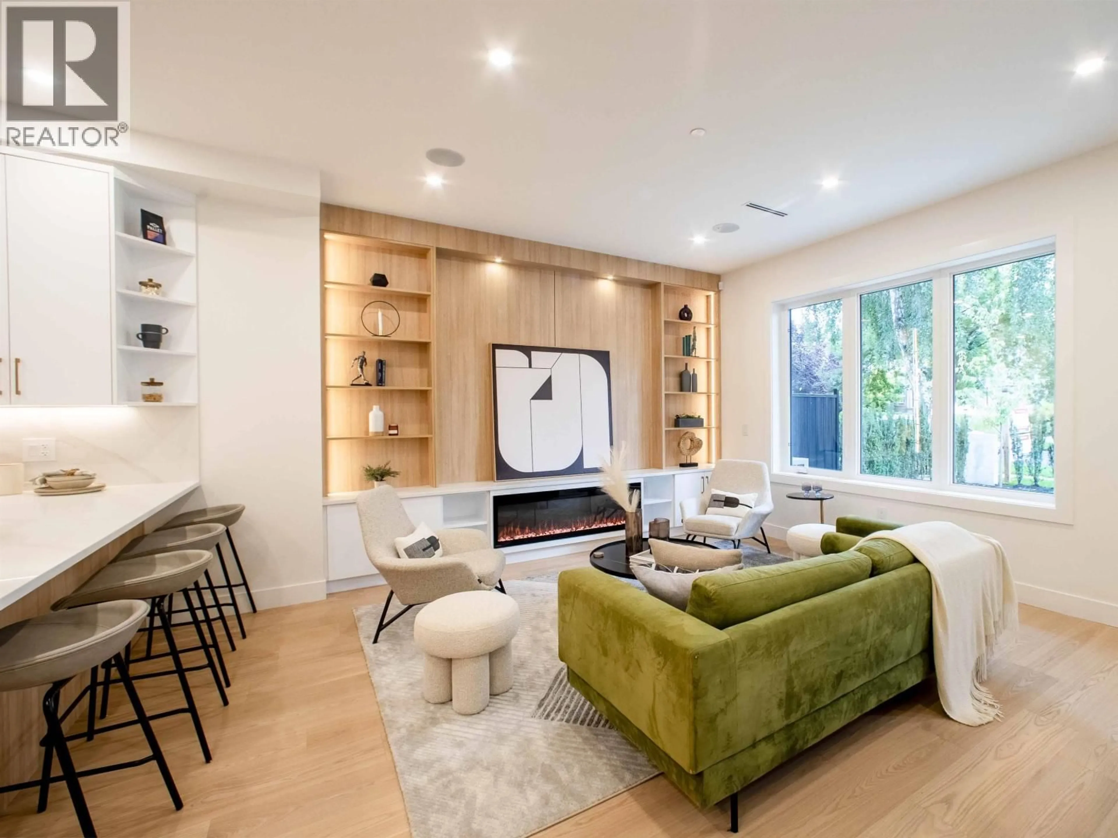 Living room with furniture, wood/laminate floor for 1 - 2785 21 AVENUE, Vancouver British Columbia V6L1K4