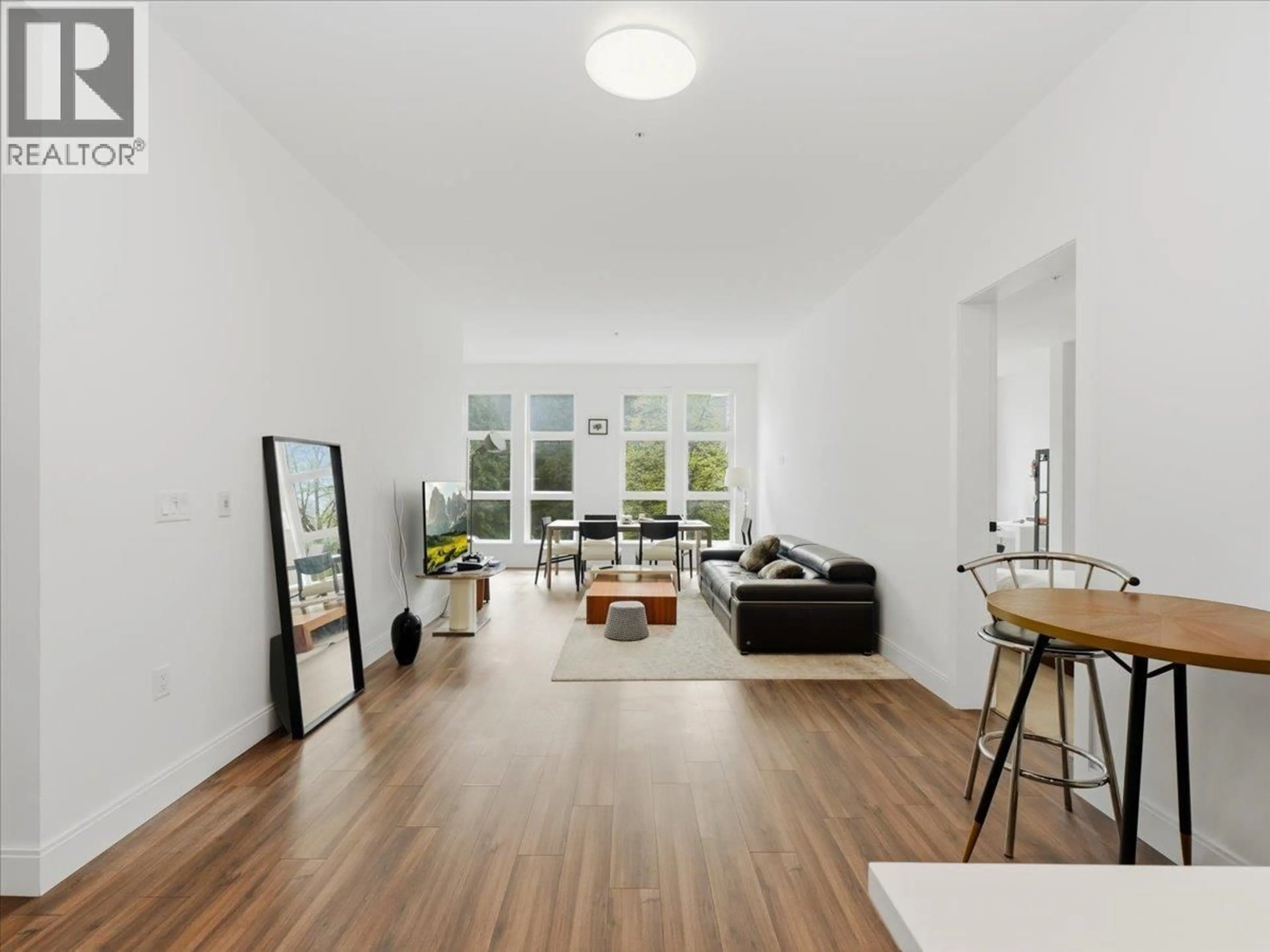 Living room with furniture, unknown for 203 - 6999 CAMBIE STREET, Vancouver British Columbia V6P0J1