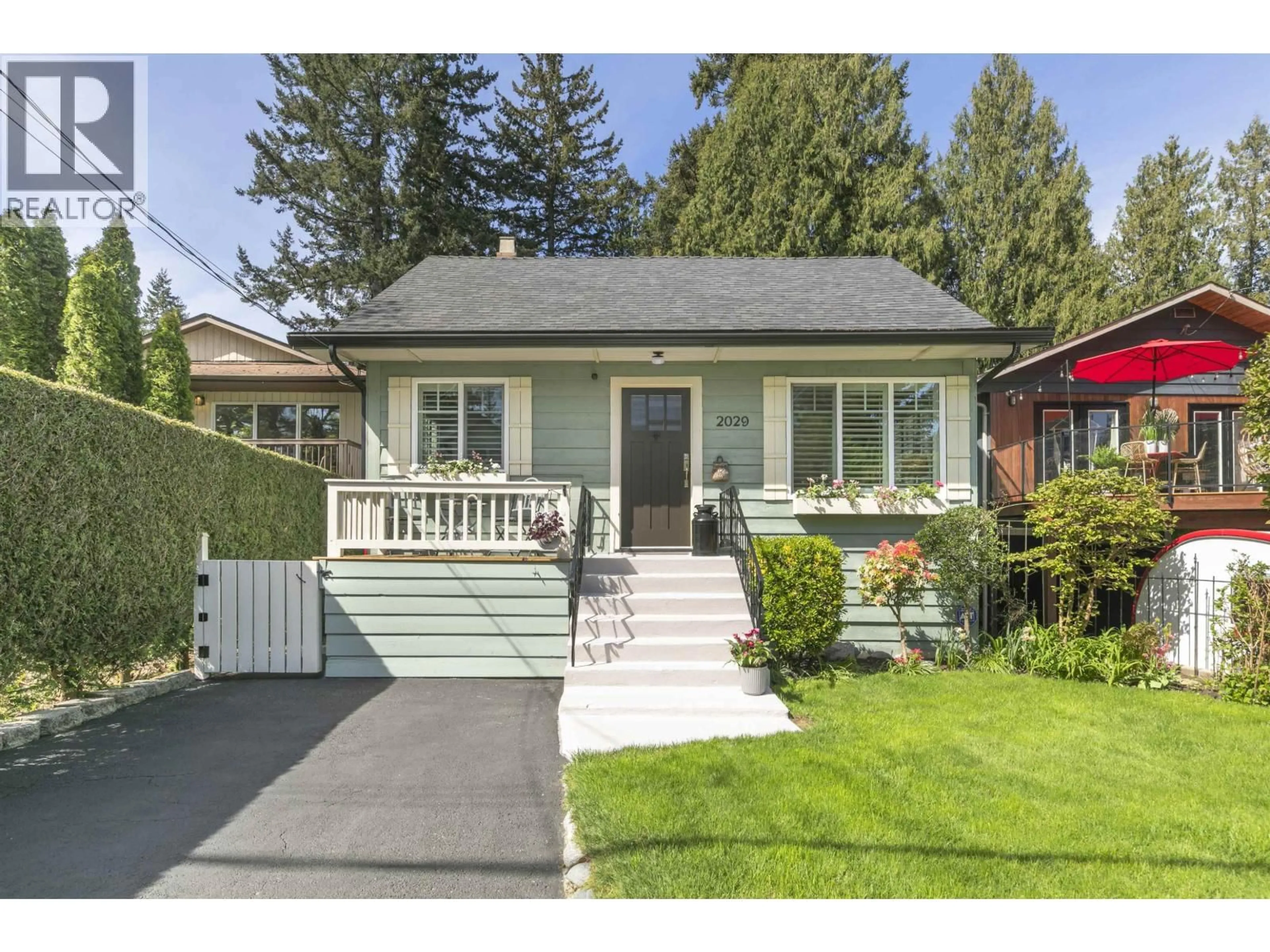 Home with vinyl exterior material, street for 2029 PHILIP AVENUE, North Vancouver British Columbia V7P2W5
