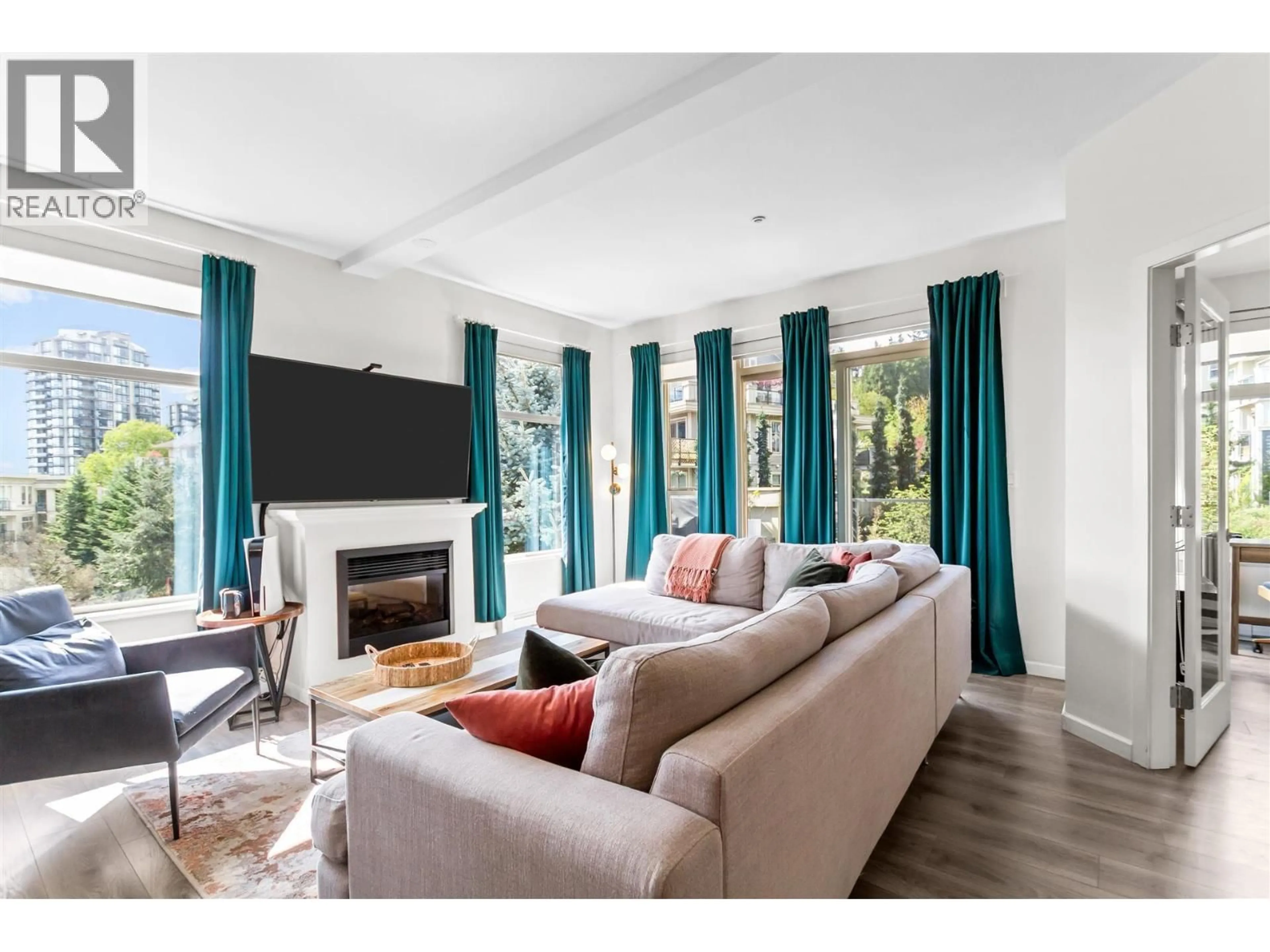 Living room with furniture, unknown for 305 - 270 FRANCIS WAY, New Westminster British Columbia V3L0C3